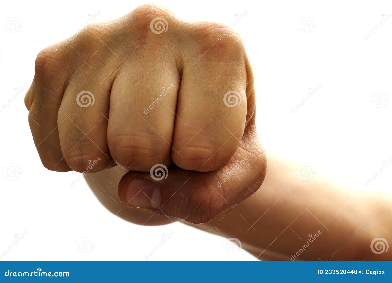 Fist punching through stock photo. Image of gesture 233520440