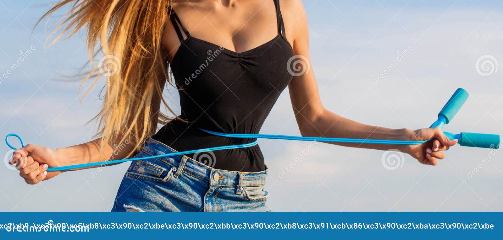 fit fitness girl measuring her waistline with measure tape. athletic slim woman measuring her waist by measure tape