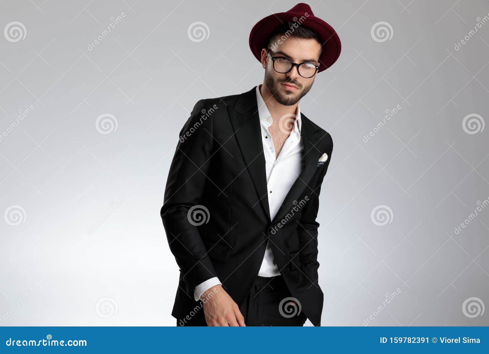 Businessman Standing Bent To a Side with Hand in Pocket Stock Image ...