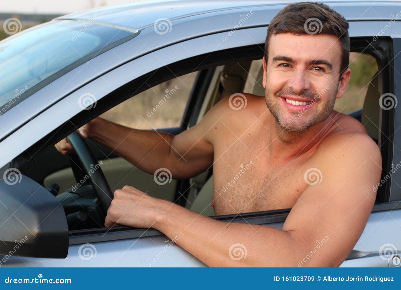 Fit Handsome Shirtless Man Smiling in His Car Stock Image - Image of