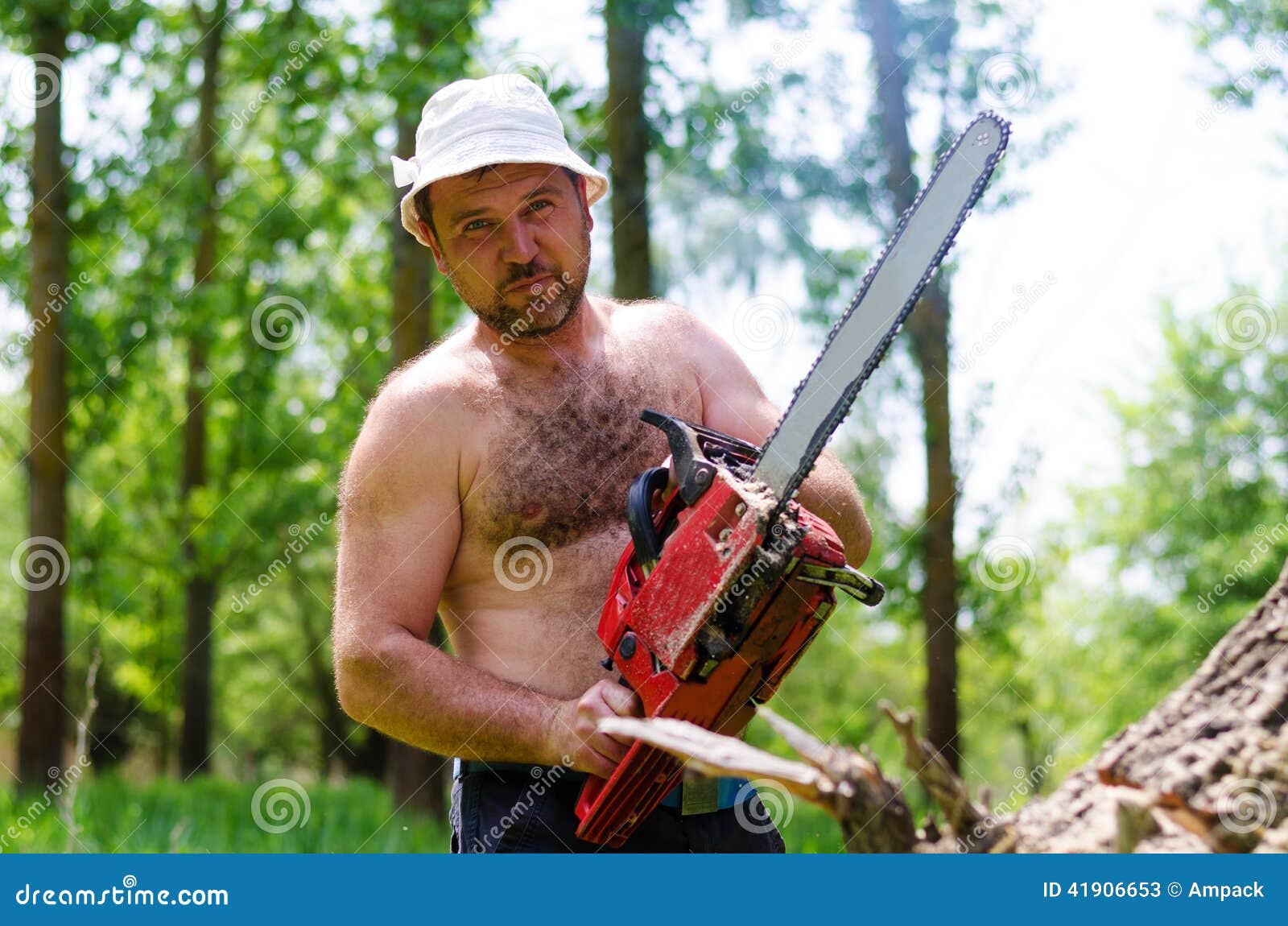 Fit Man Carrying a Chainsaw in Woodland Stock Image - Image of chain ...