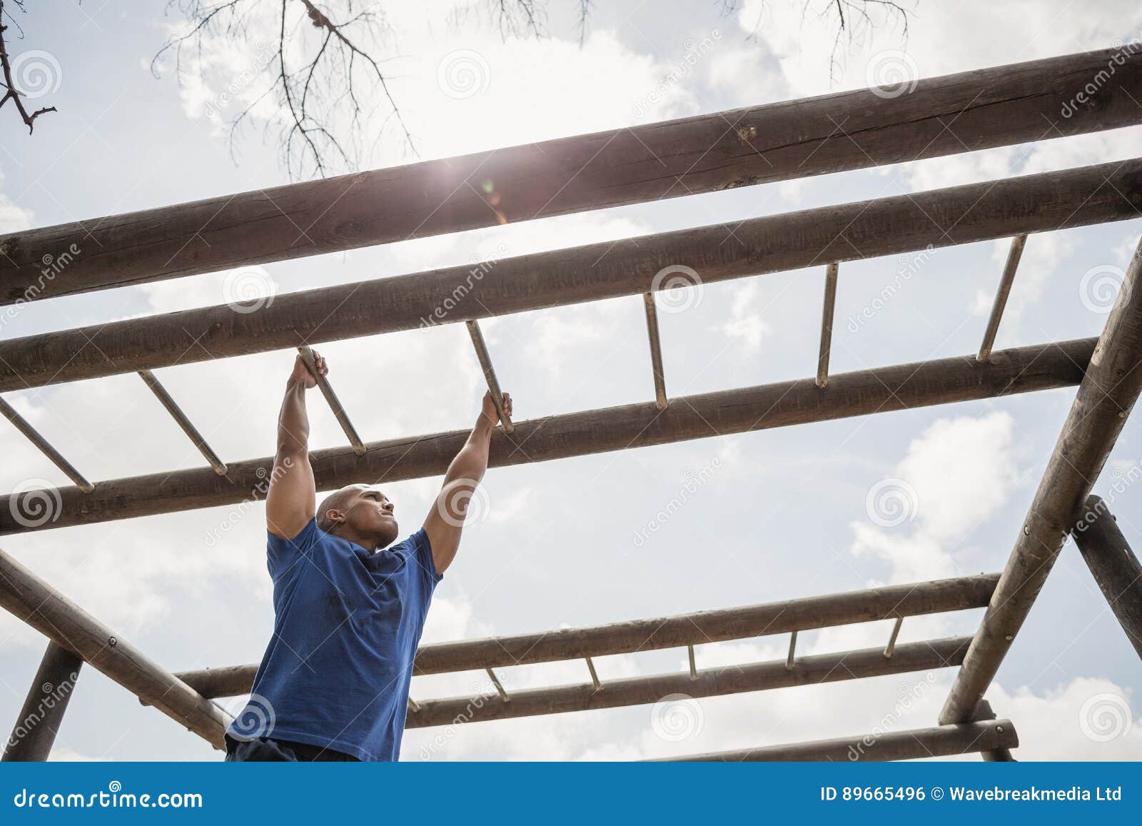 Fit Man Climbing Monkey Bars during Obstacle Course Stock Photo Image of exercise, healthy