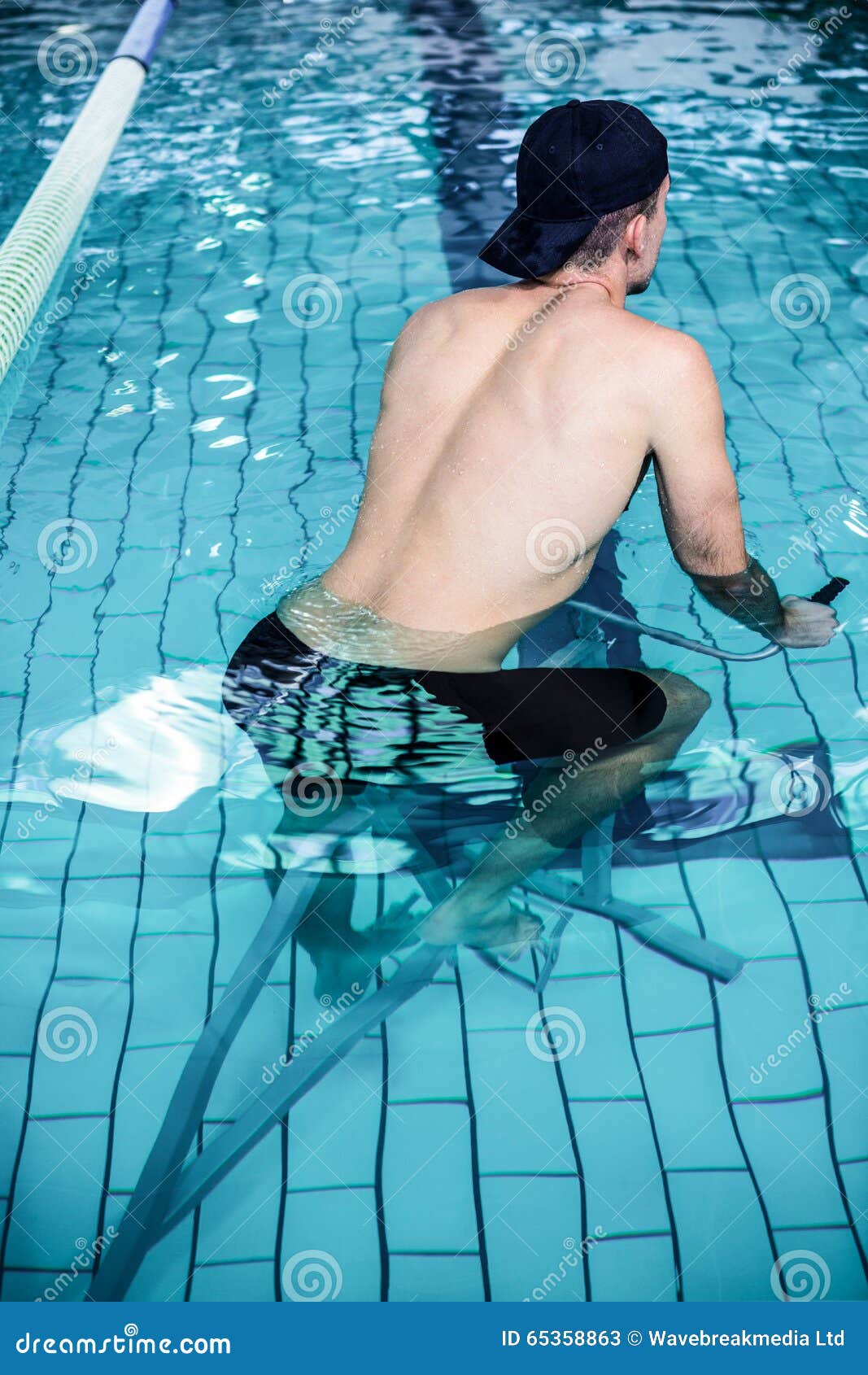 Fit Man Cycling in the Pool Stock Image Image of aerobics, pursuit 65358863