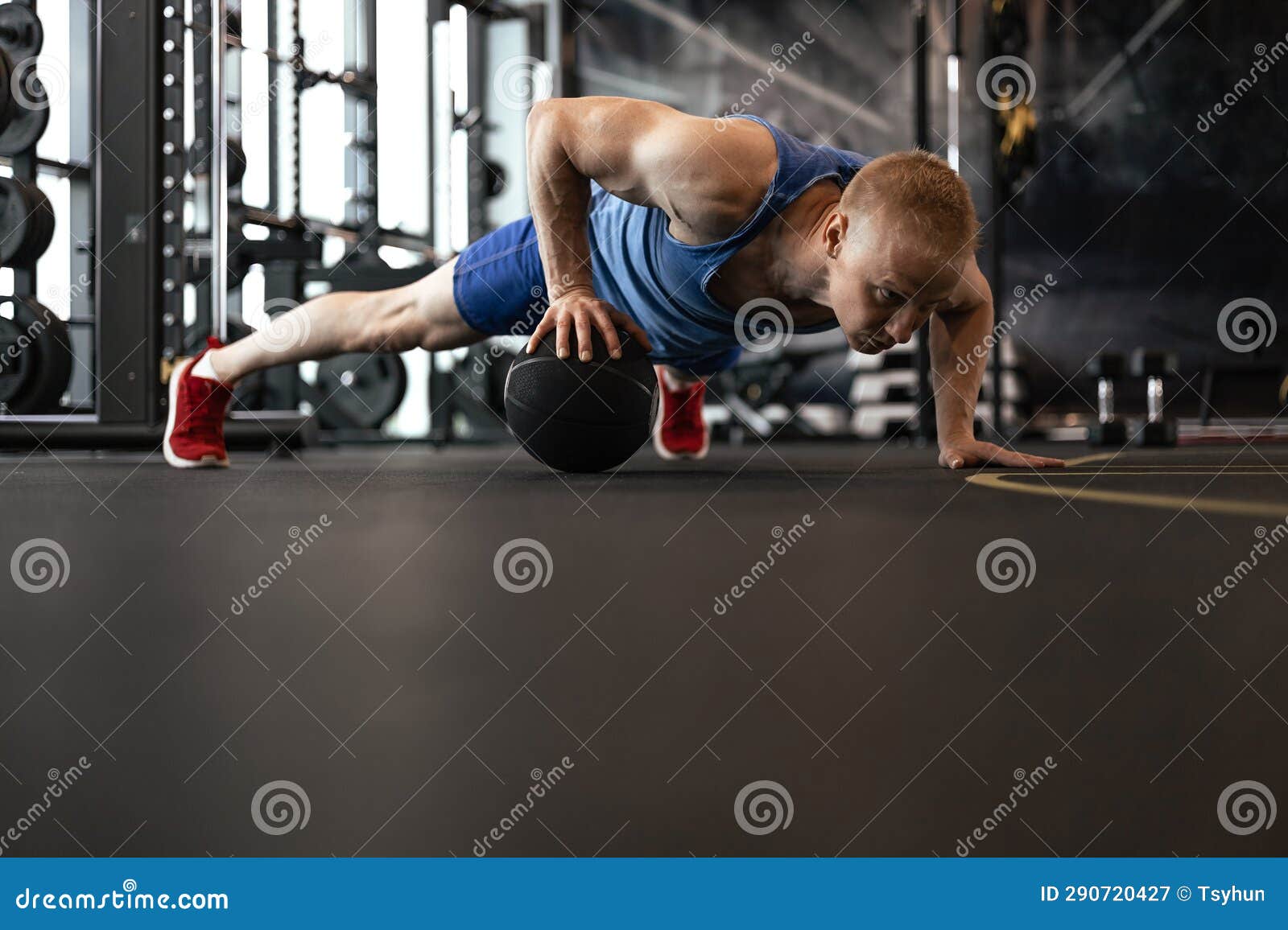 Fit Man Doing Push Ups on Medicine Ball at the Gym. Stock Image Image