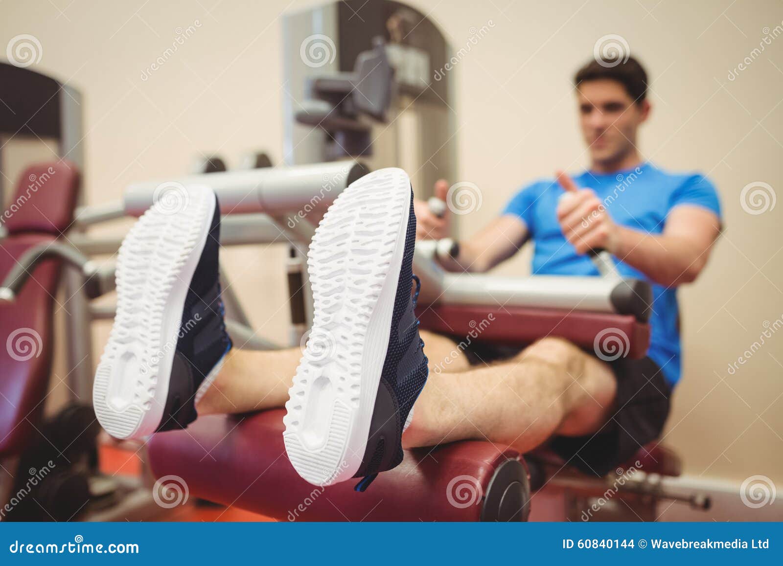 Fit Man Using Weights Machine for Legs Stock Photo Image of