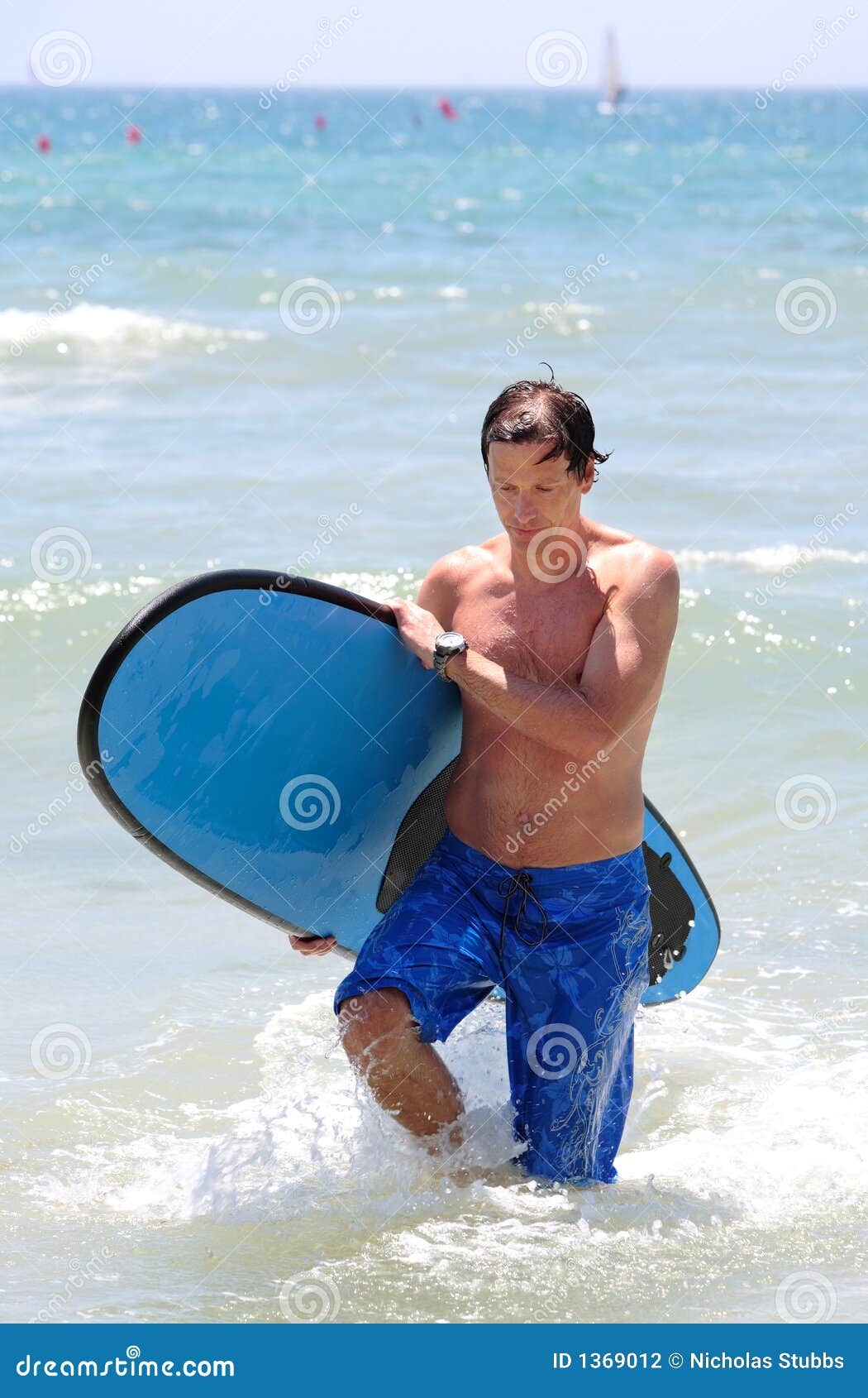 Fit Middle Aged Man Surfing on Beach in Summer Stock Photo - Image of ...