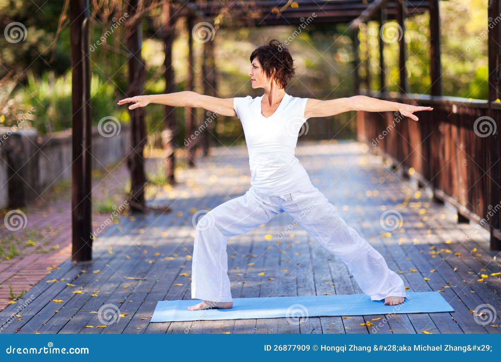 Middle Aged Woman Doing Expert Yoga Stock Photo - Download Image