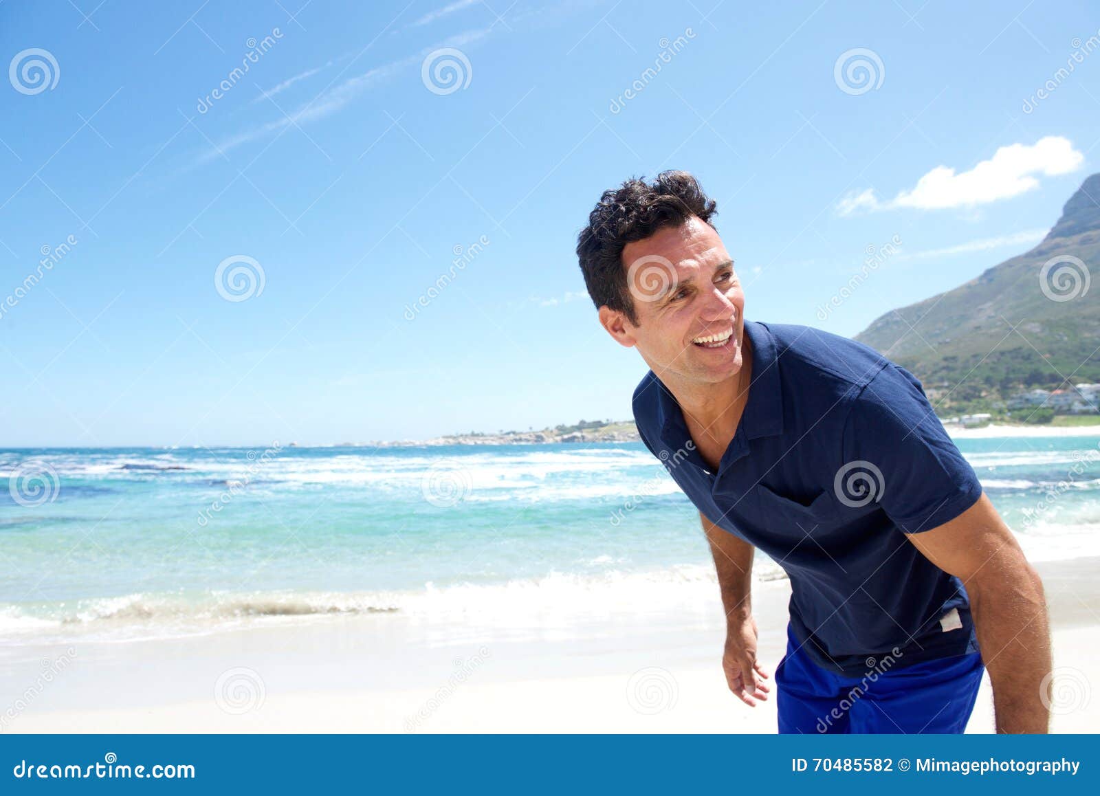 Fit older man at the beach stock photo. Image of middle - 70485582