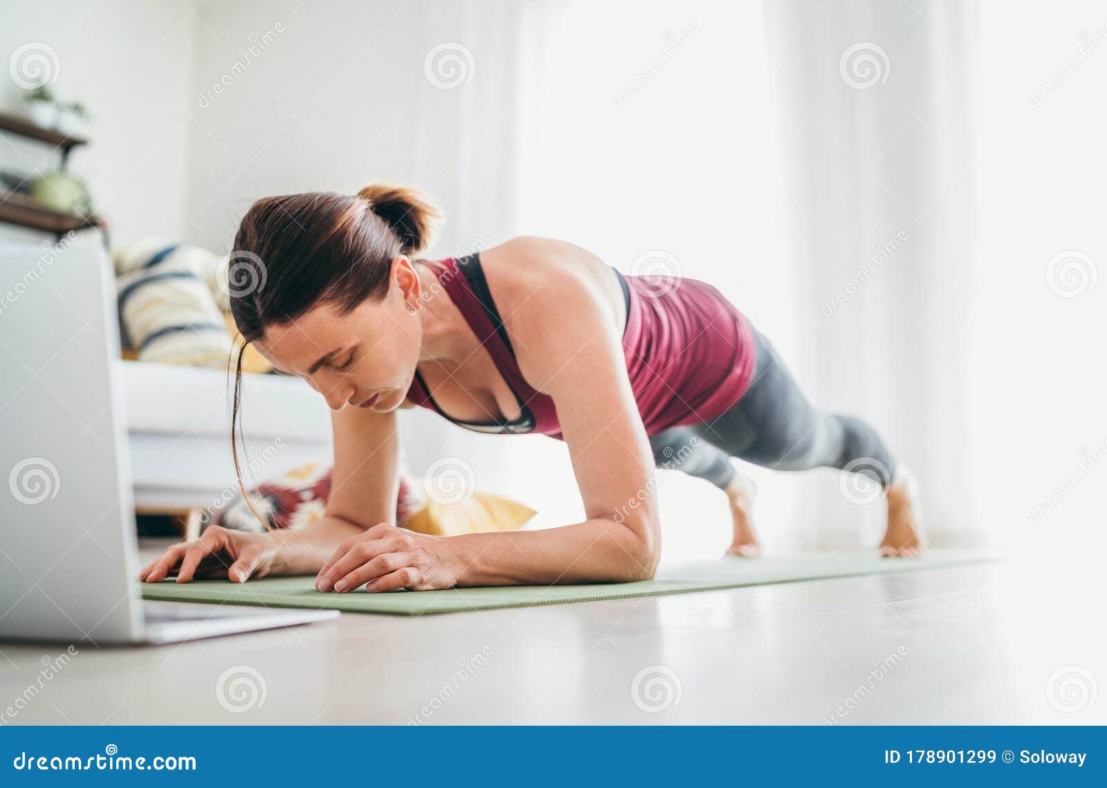 Fit Sporty Healthy Woman on Mat in Low Plank Chaturanga Dandasana Yoga  Pose, Doing Breathing Exercises, Watching Online Yoga Class Stock Image -  Image of practice, gymnastics: 178901299