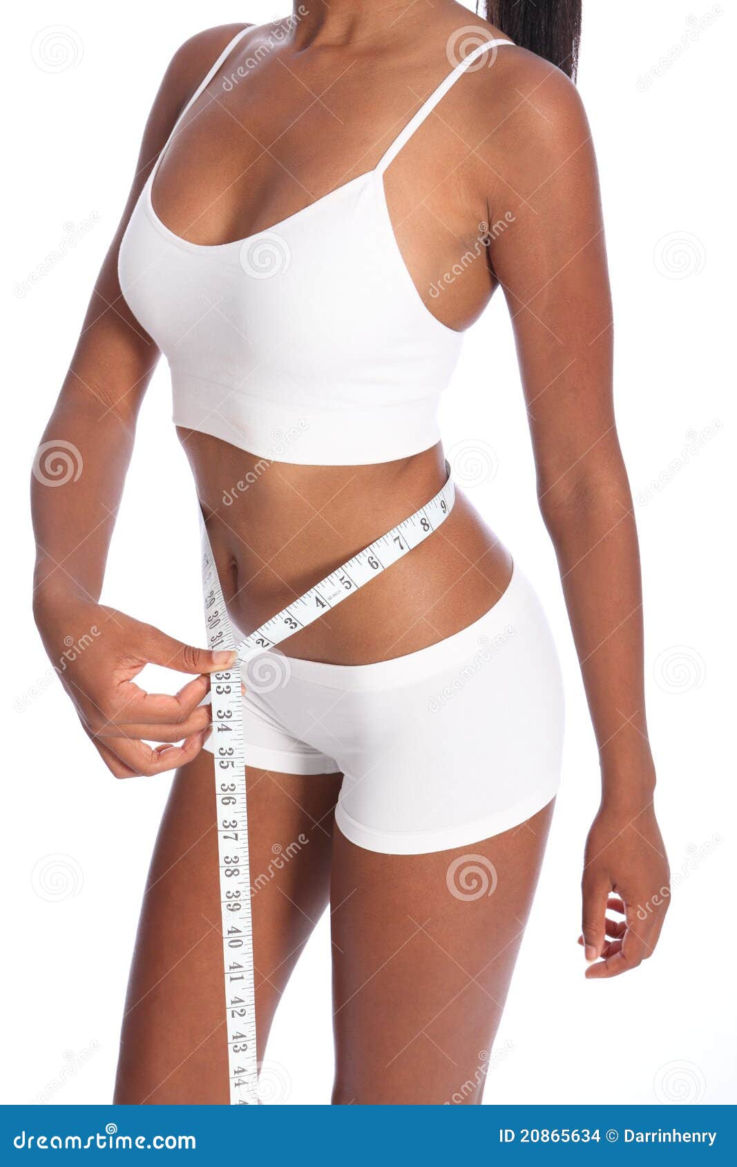 Fit woman measuring her waist. Weight loss concept. Royalty-Free Stock  Image - Storyblocks