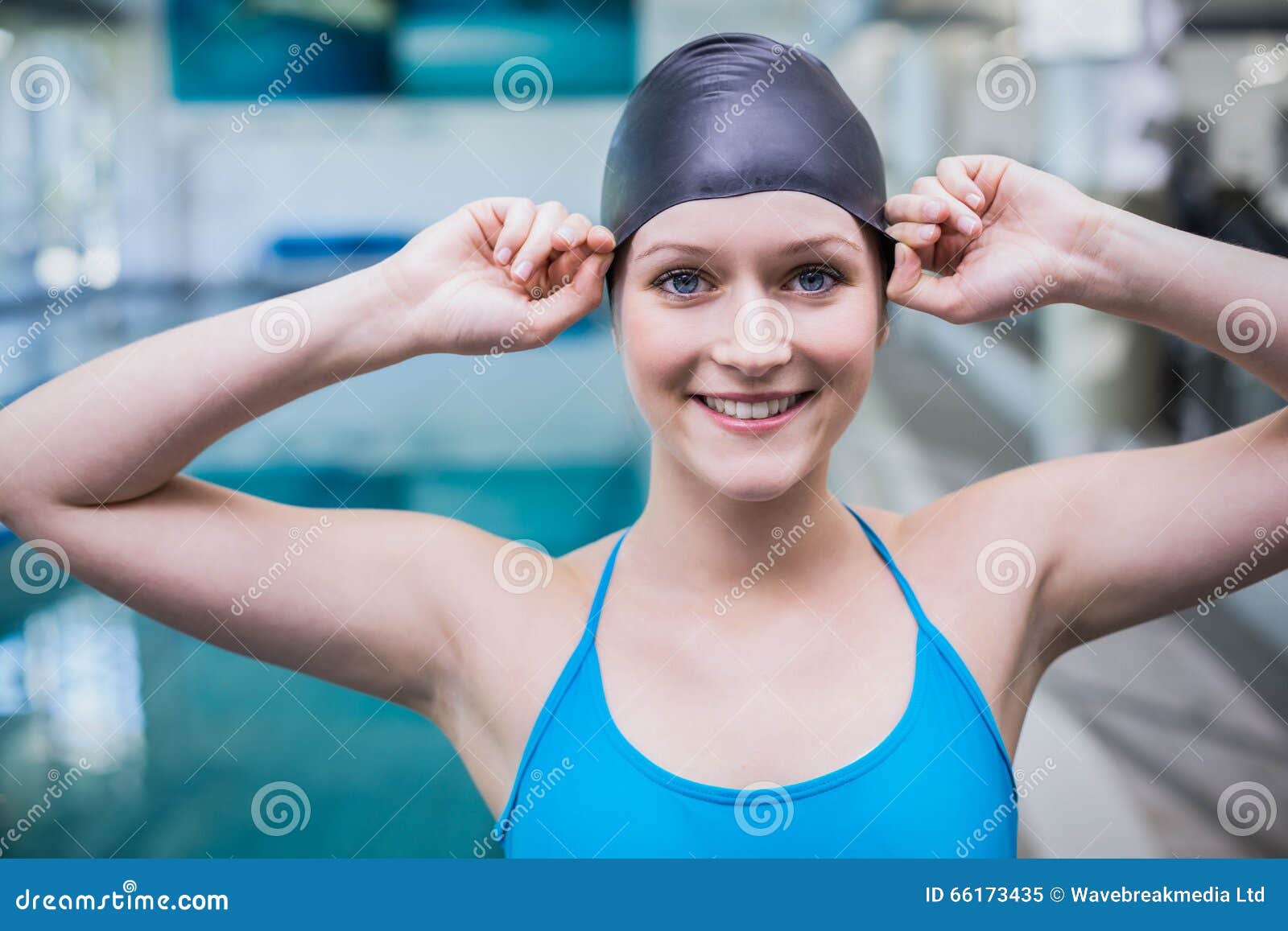 Fit Woman Putting on Swim Cap Stock Image Image of adult, beautiful