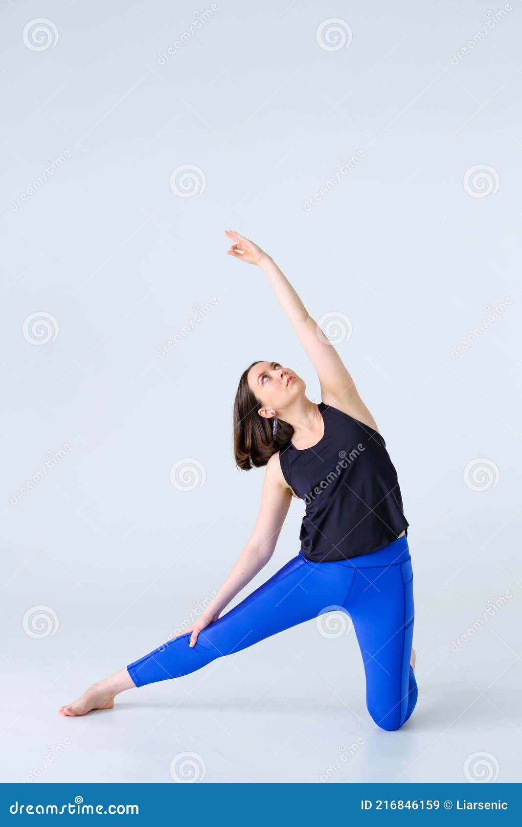 Fit Woman in Sportswear Practicing Yoga Gate Pose at Home. Stock Image -  Image of floor, daylight: 216846159