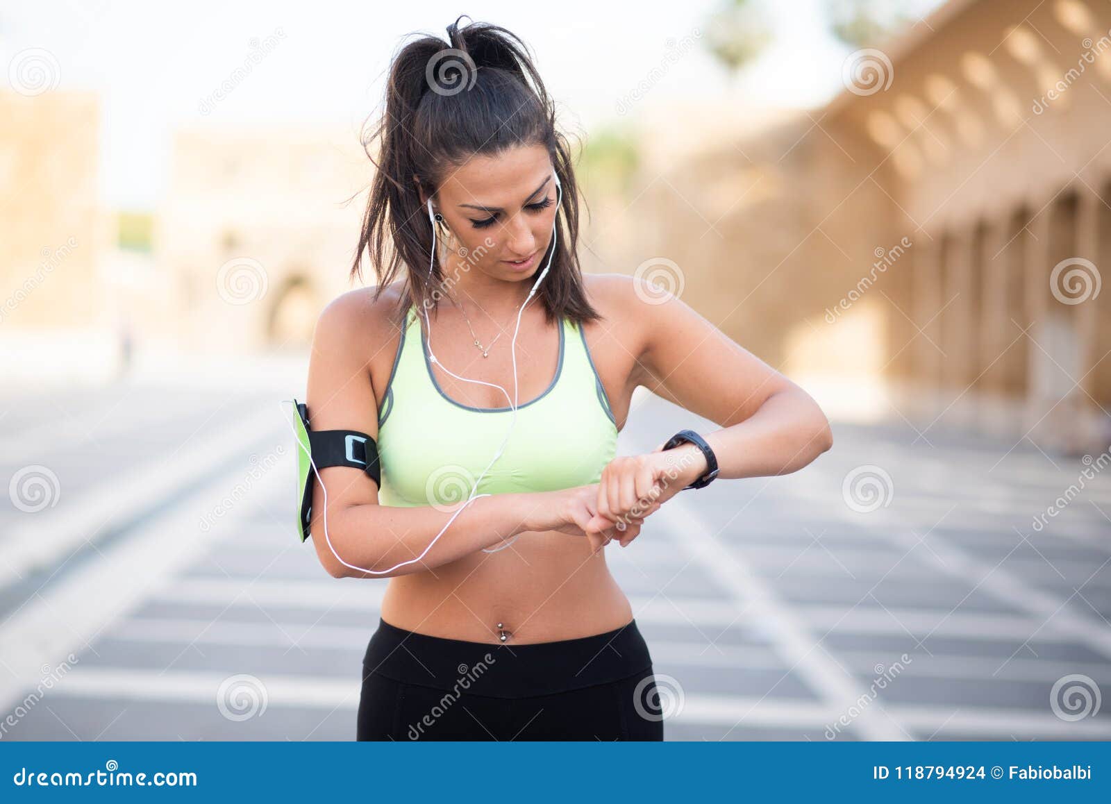 Fit Woman Timing Her Heart Rate with Watch Stock Photo - Image of ...