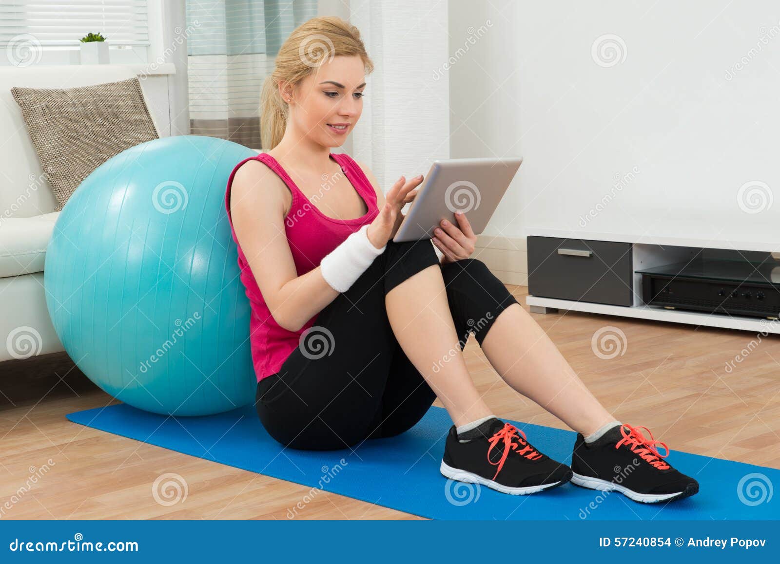 Fit Woman Using Digital Tablet Stock Photo Image of positive 57240854