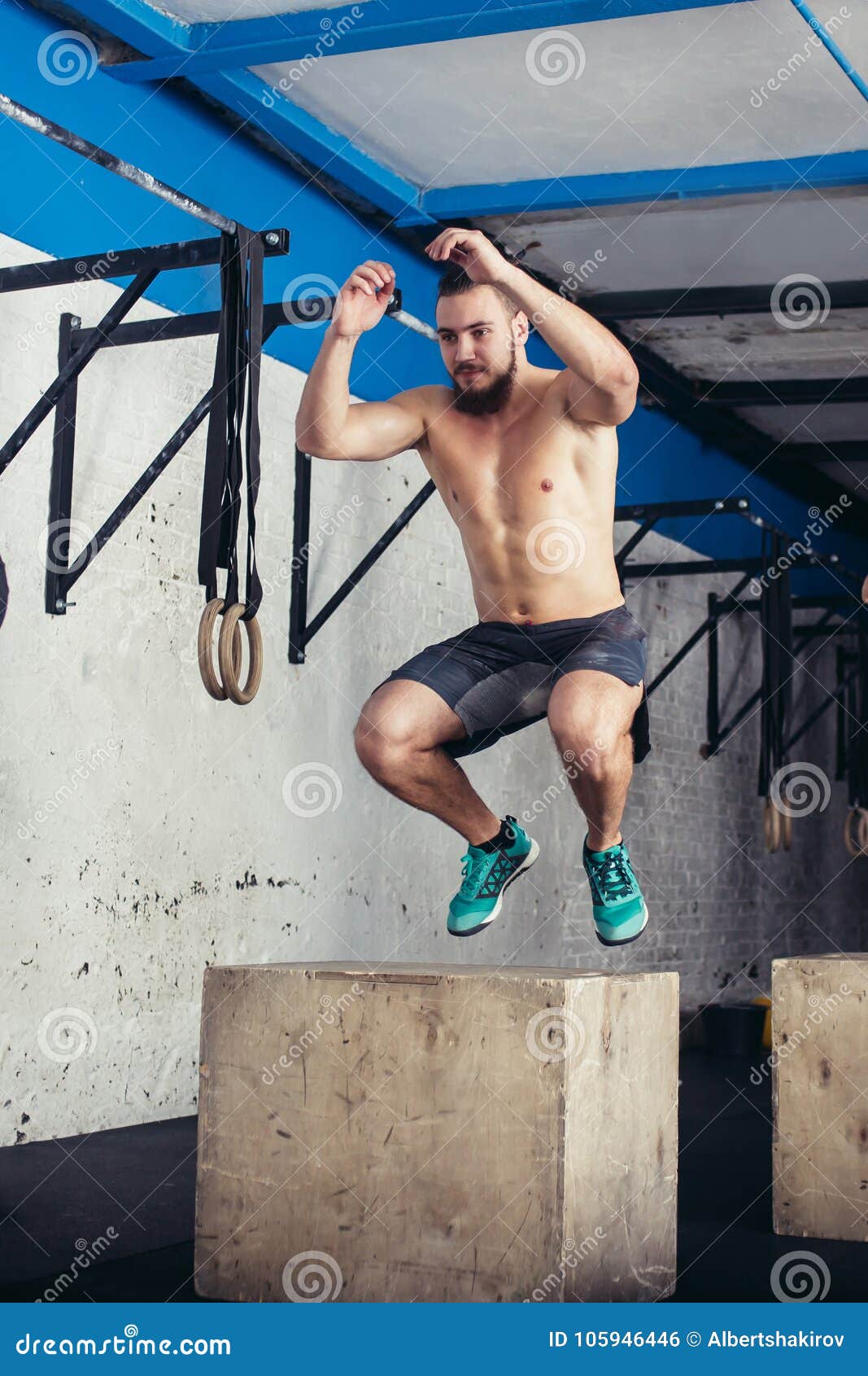 Fit Man Doing Box Jumps in a Gym Stock Photo Image of circuit, fitness 105946446