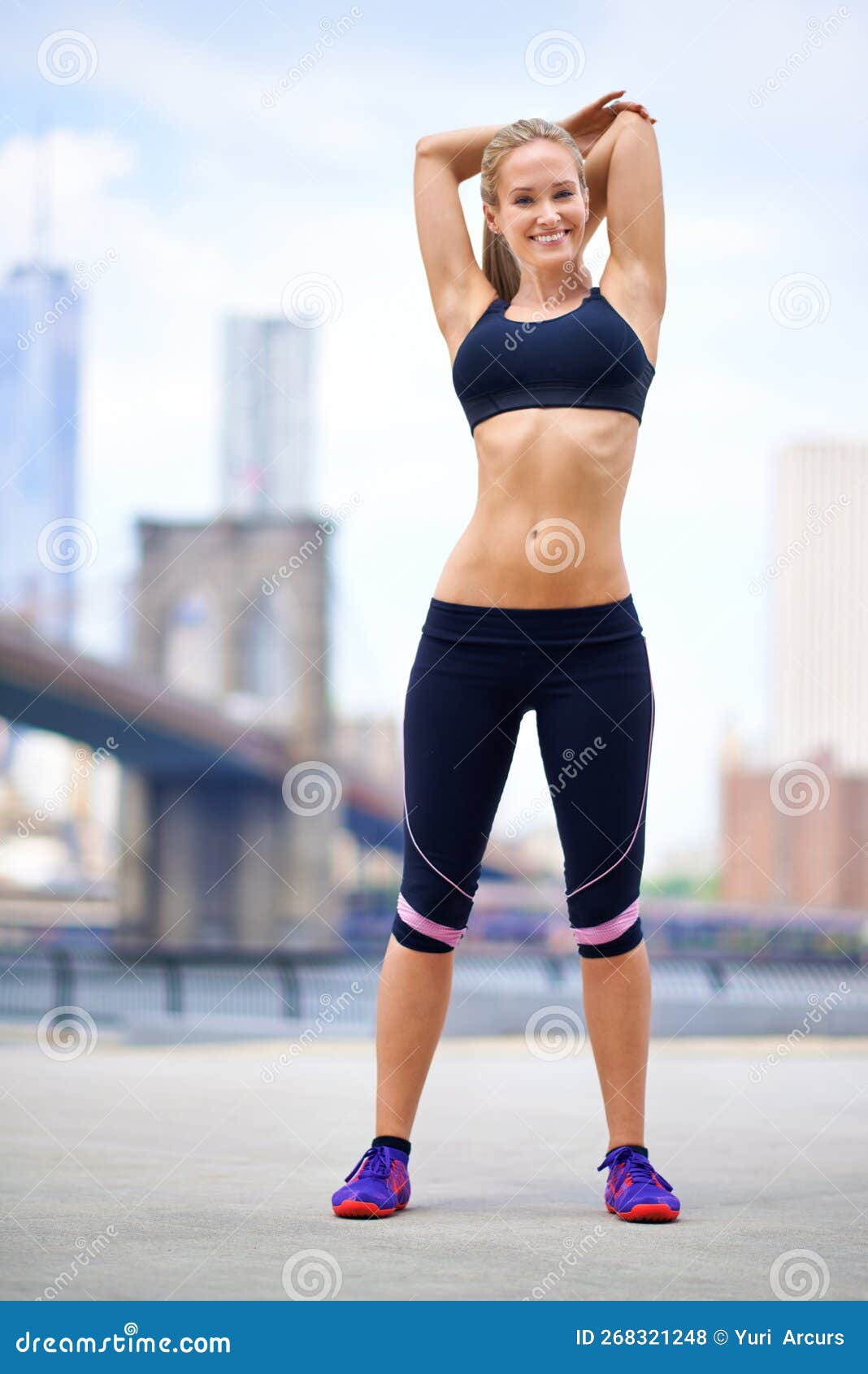 Fitness Enthusiast. Portrait of a Beautiful Woman Stretching before Her Run  in the City. Stock Photo - Image of smiling, city: 268321248
