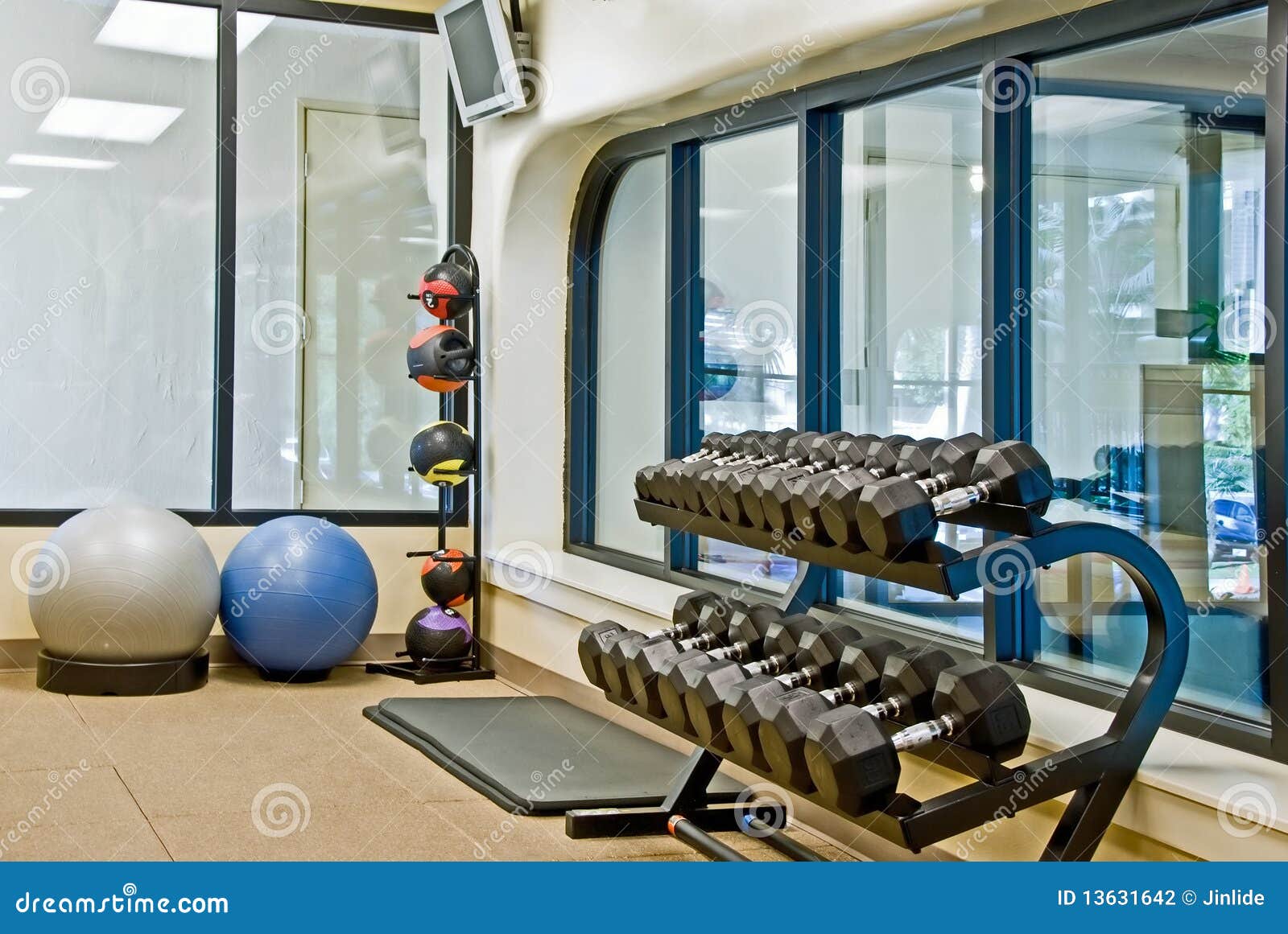 Fitness Equipments in a Gym Stock Photo Image of light, equipments