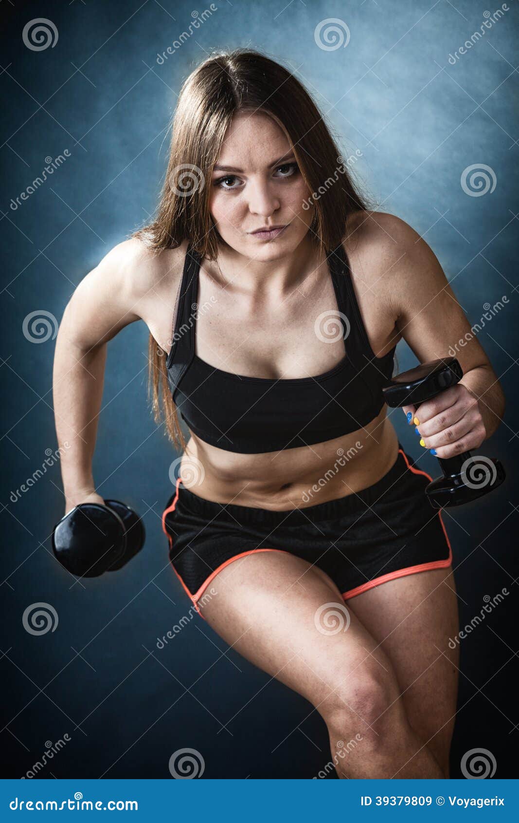 Fitness Girl Training Shoulder Muscles Lifting Dumbbells Stock Image