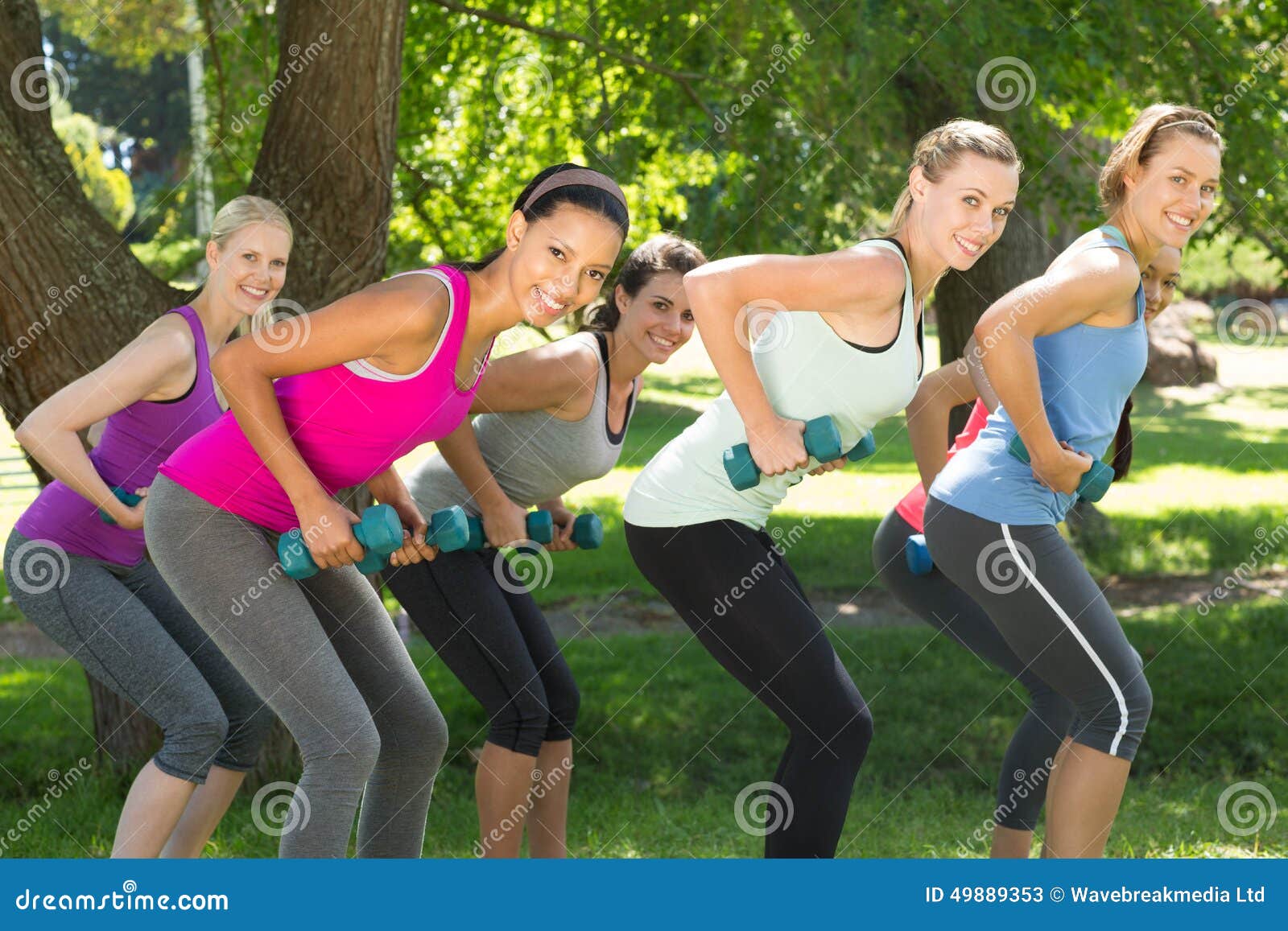 Fitness Group Lifting Hand Weights in Park Stock Image Image of