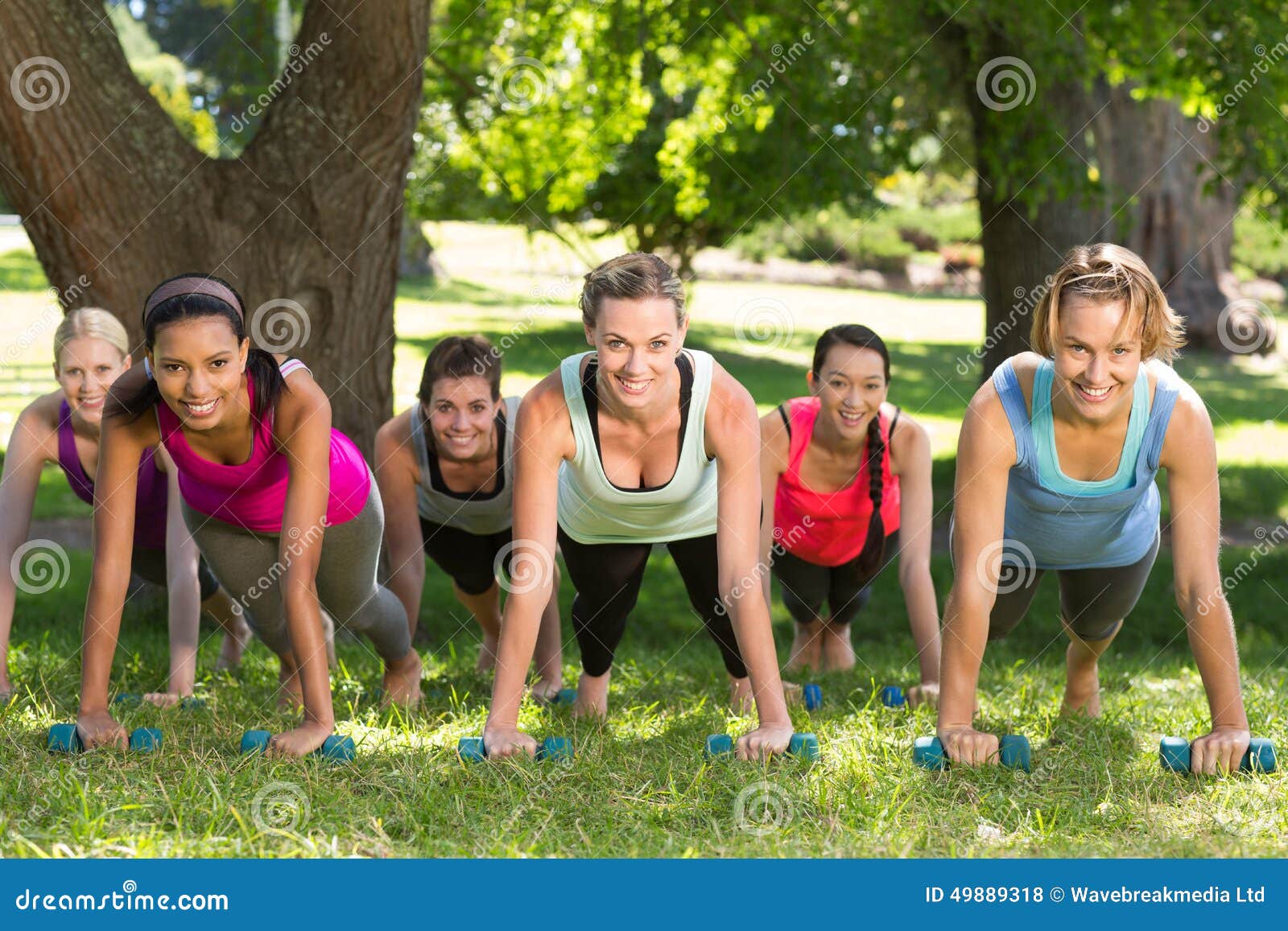 fitness group planking in park