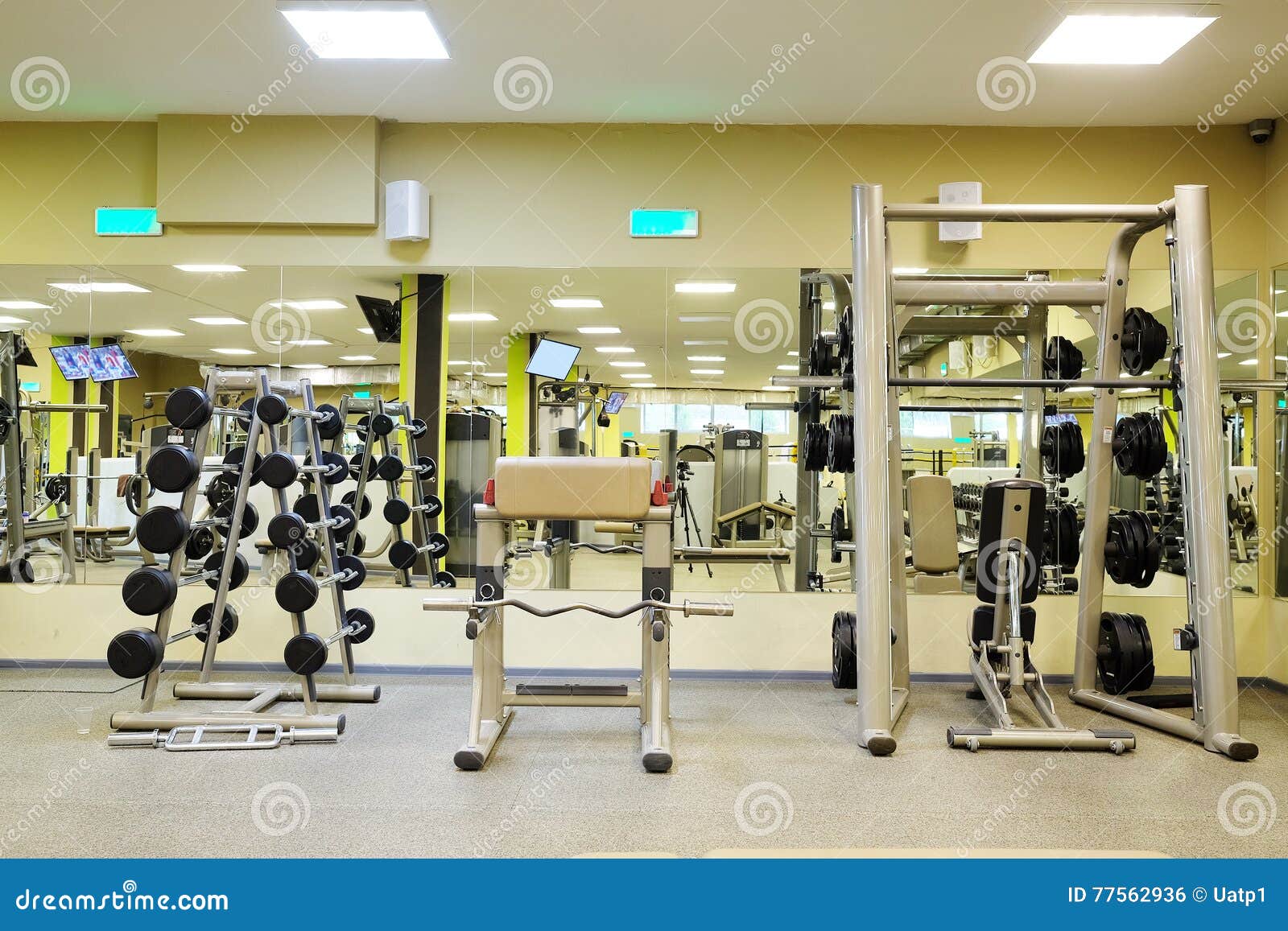 fitness hall with wights and other sport equipment