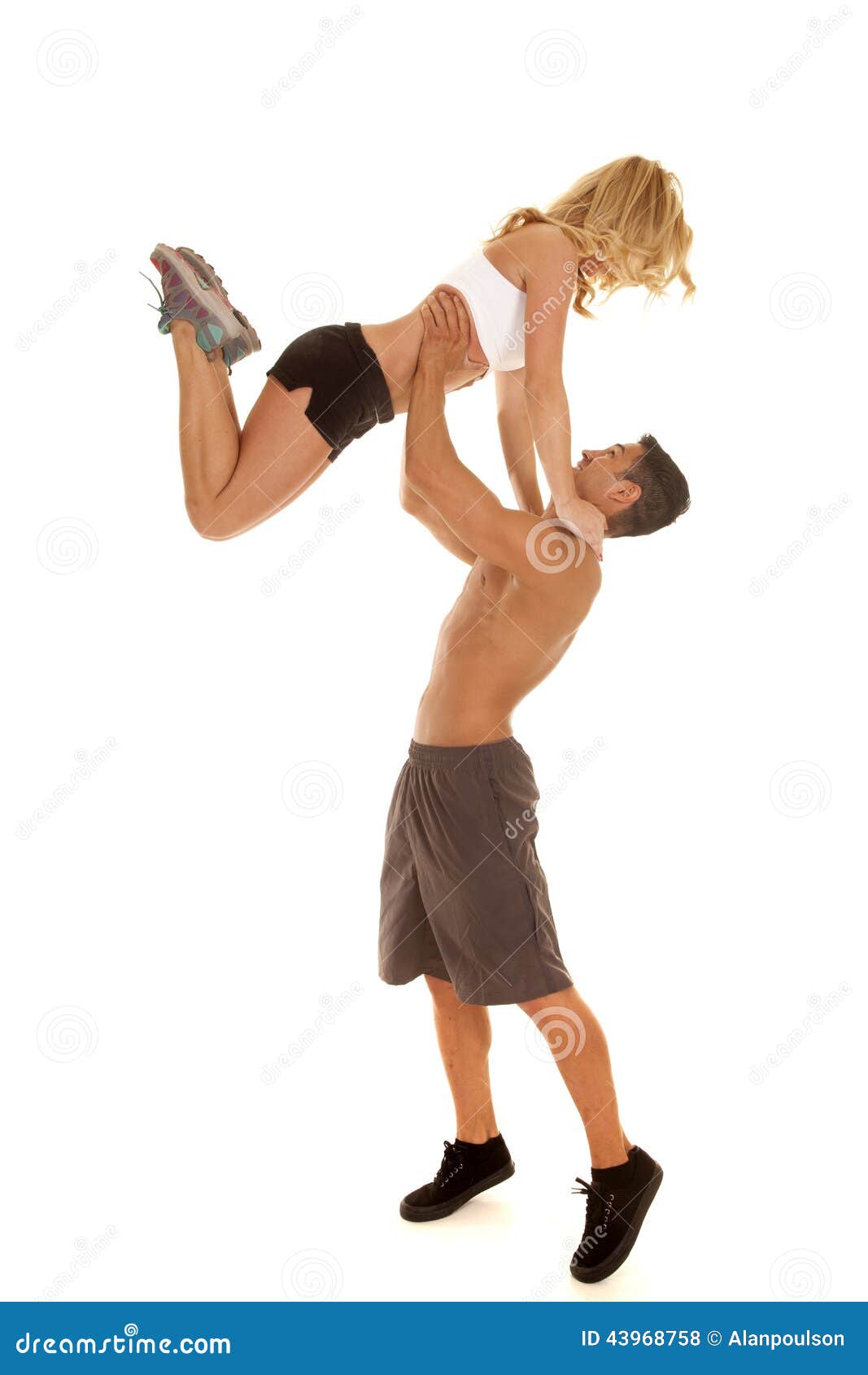Fitness Man Hold Woman Up By Waist Facing Each Other Stock Photo ... picture
