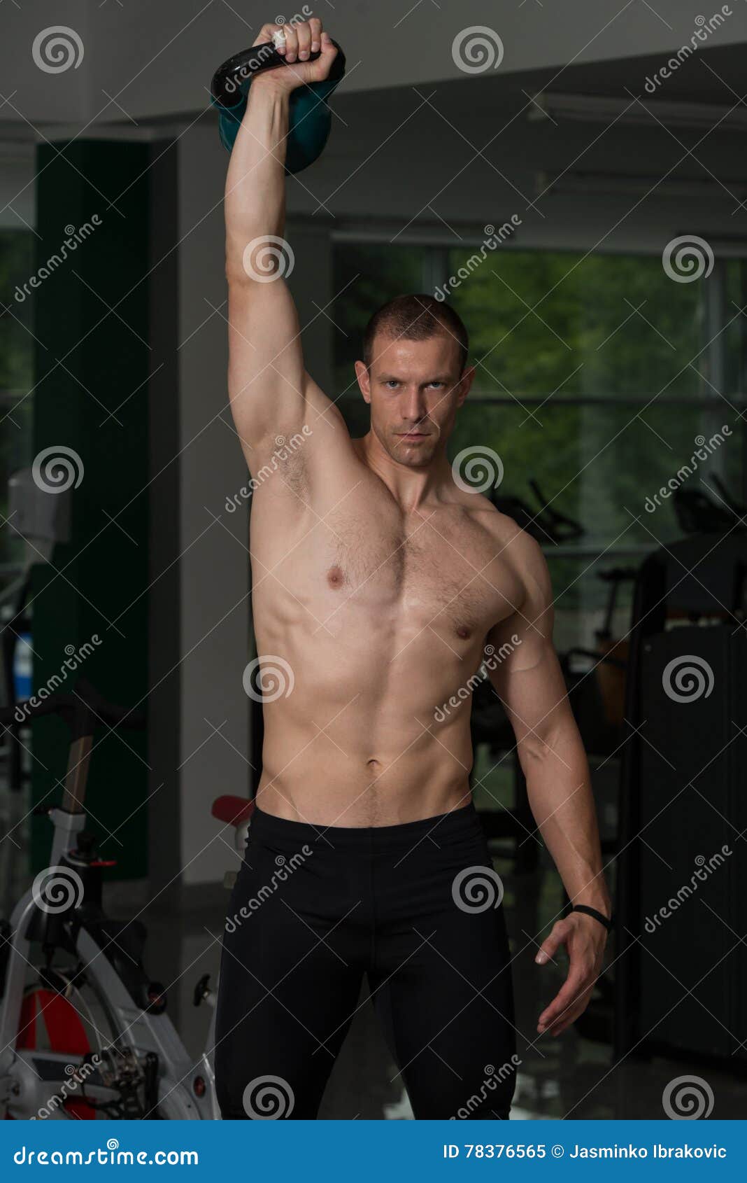 Fitness Man Using Kettlebells Inside Gym Stock Image Image of indoors