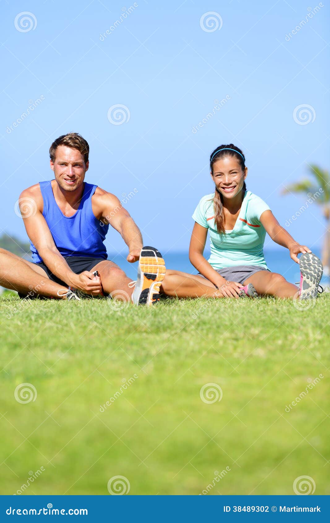 Smiling Young Couple Training Outside Together · Free Stock Photo