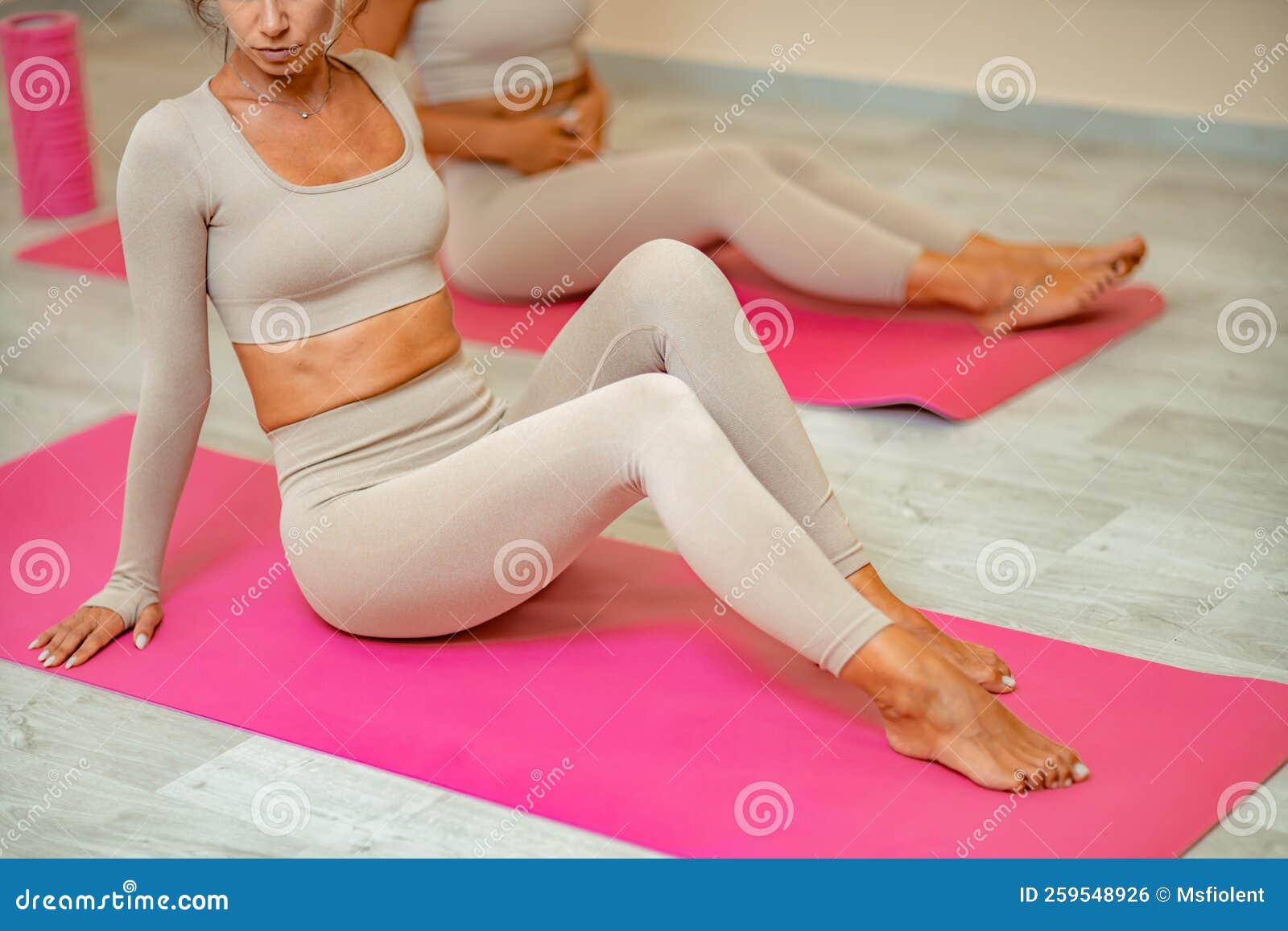 Fitness, Pilates Stretching Exercises, a Group of Two Attractive Smiling  Mature Women in Beige Sports Clothes, Train in Stock Photo - Image of  healthy, flexibility: 259548926