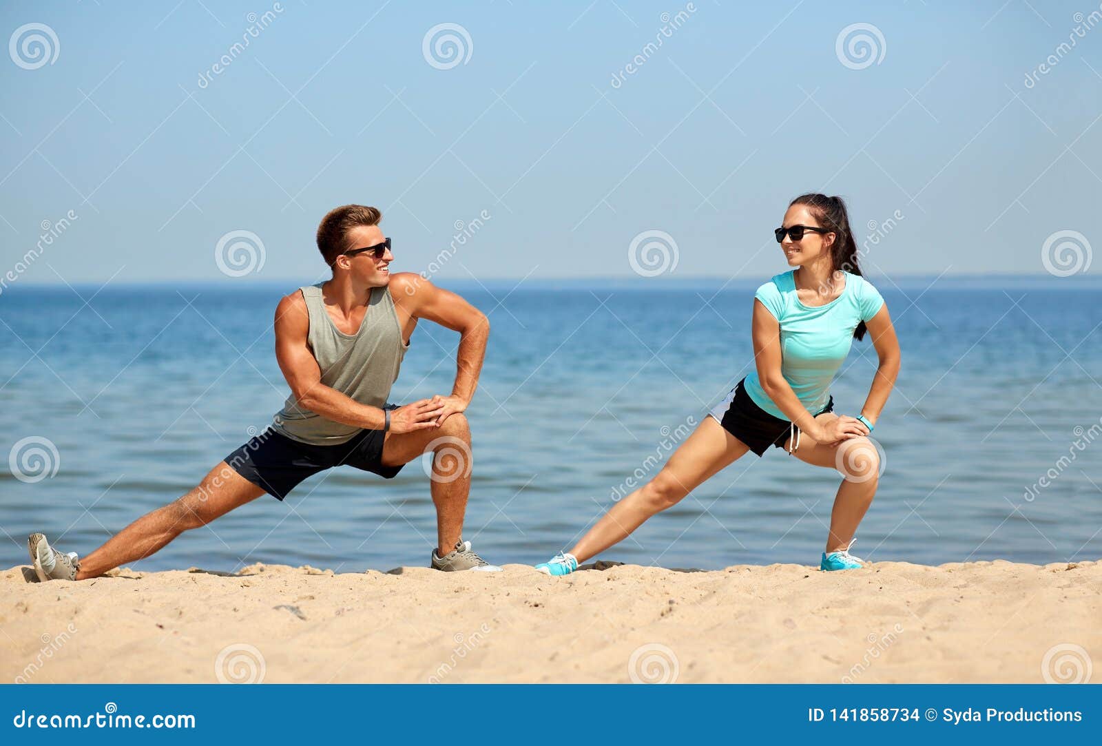 Smiling Young Couple Training Outside Together · Free Stock Photo