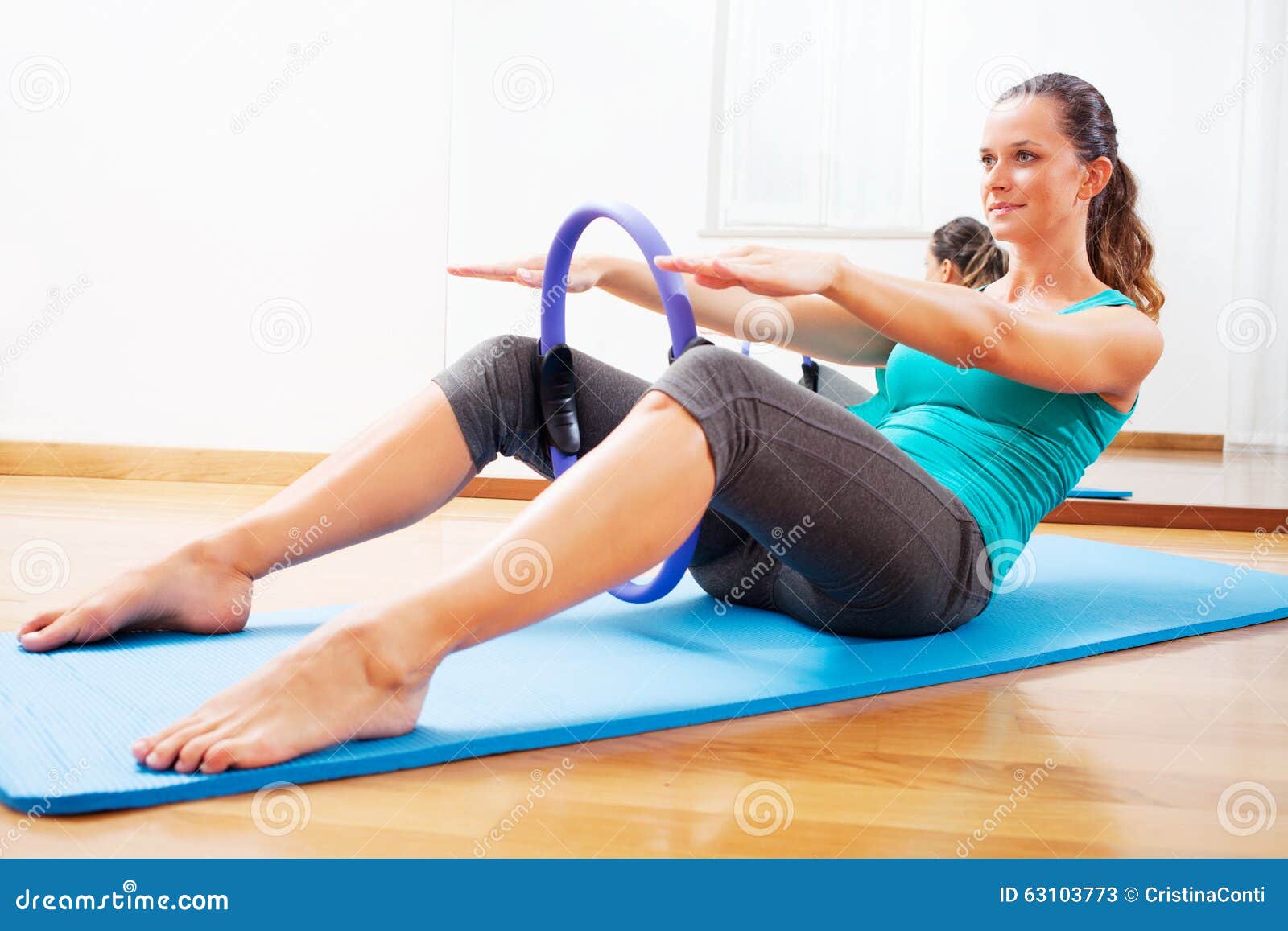 Fitness Teacher Making Exercisese with the Circle Tool Stock Image