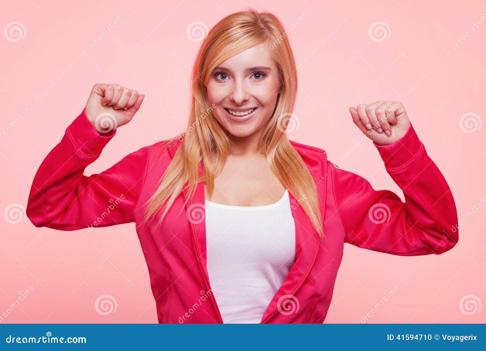 Beautiful Slim Smiling Girl Shows Biceps Isolated On White Stock Photo,  Picture and Royalty Free Image. Image 27593154.