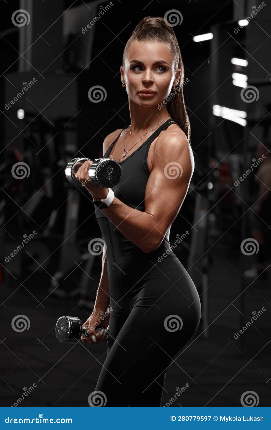 Fitness Woman Working Out in Gym Doing Exercise for Biceps