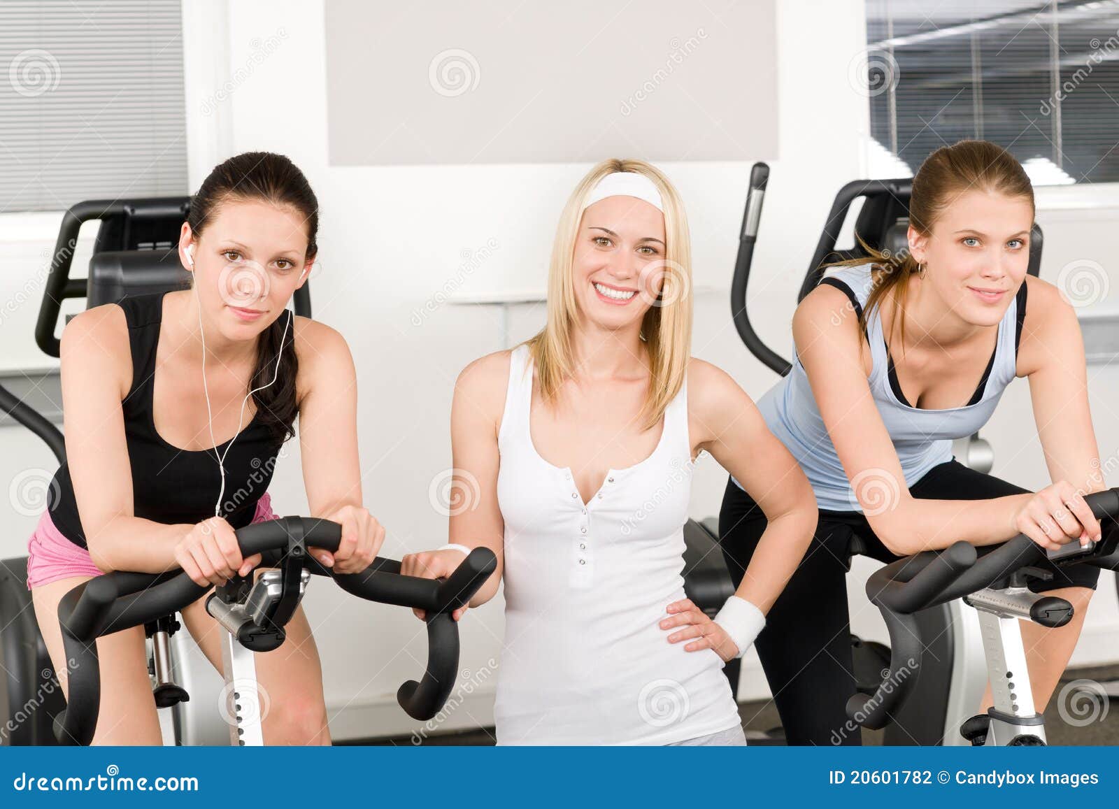 Fitness Young Girl On Gym Bike Stock Photo - Image of club 