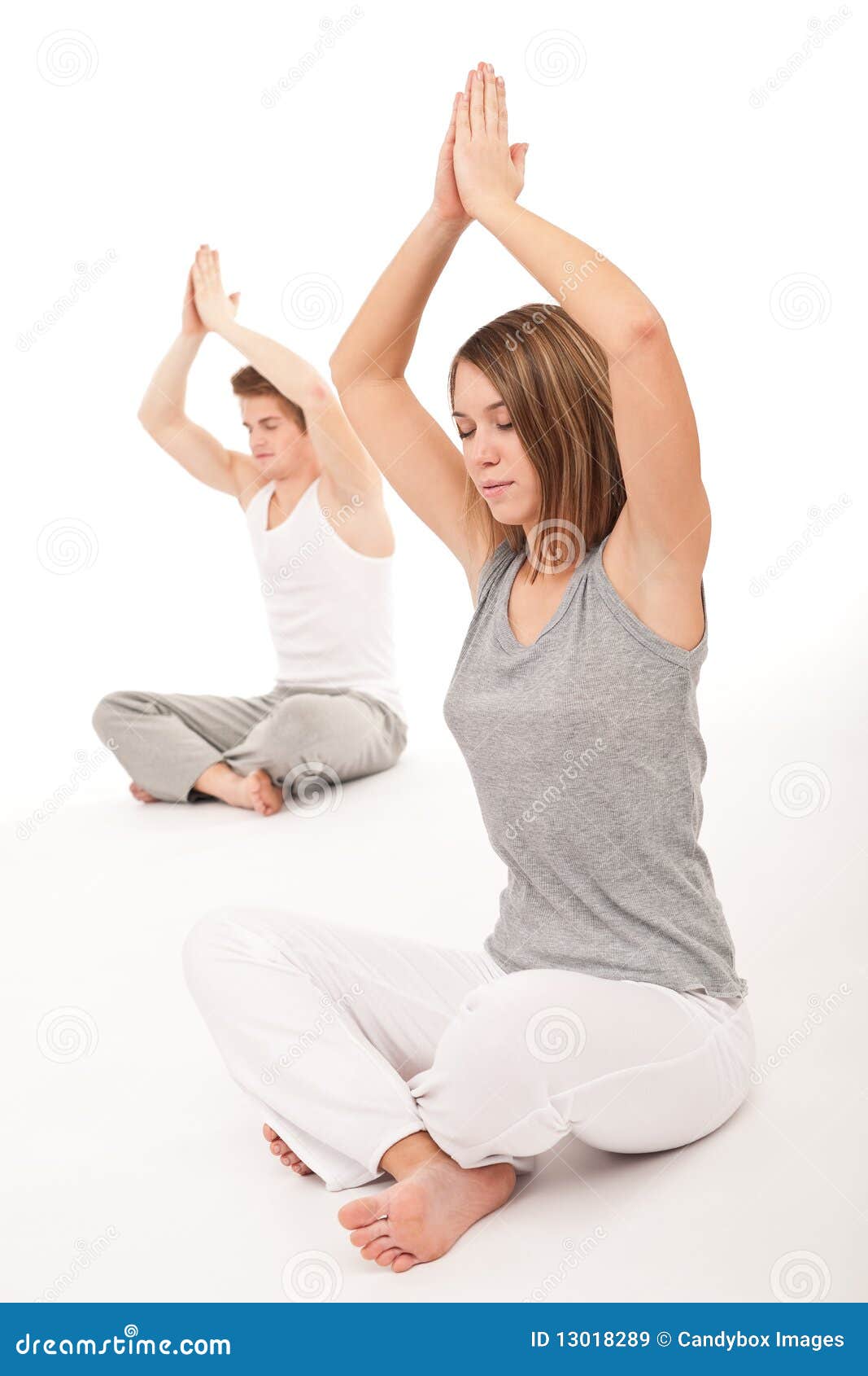 Free Photo  Yoga concept. young healthy couple in yoga position on white  background