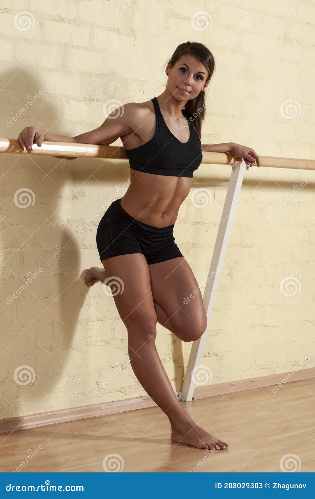 Fitness sporty woman showing her well trained body Stock Photo