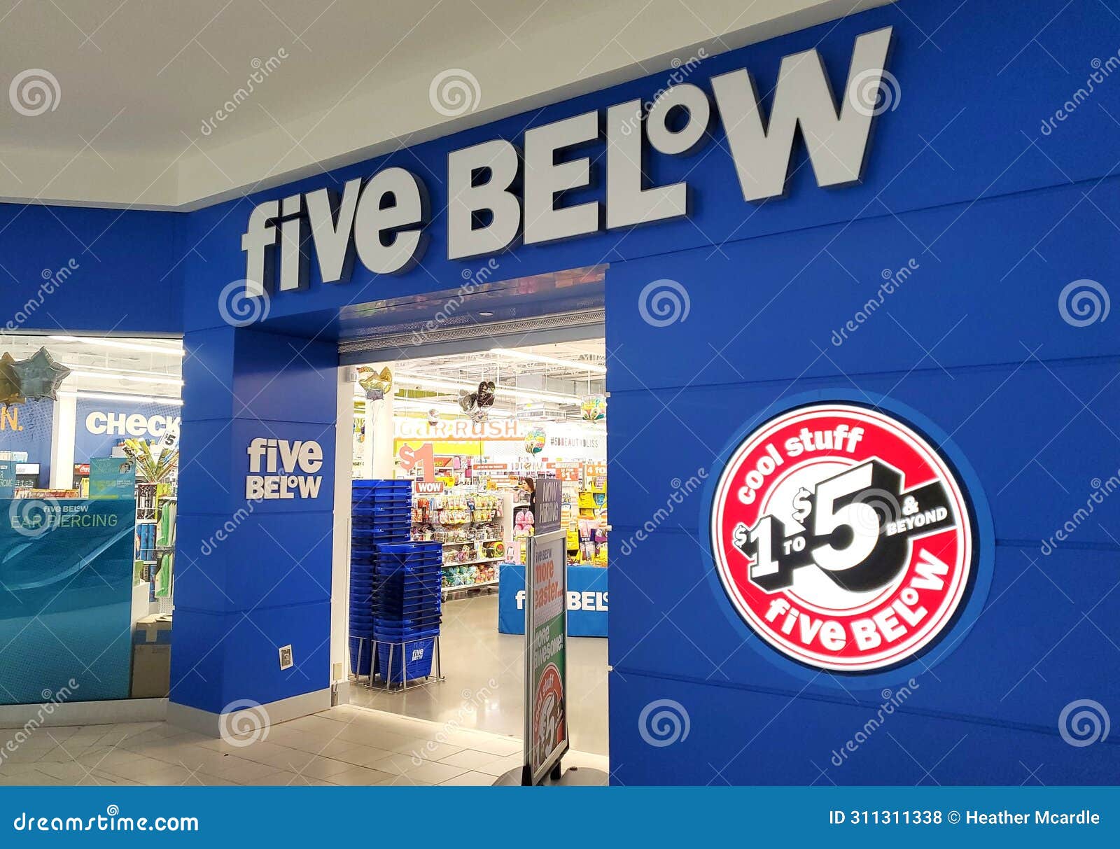 Five Below Facade Sign and Now Hiring Banner at Entrance To Store