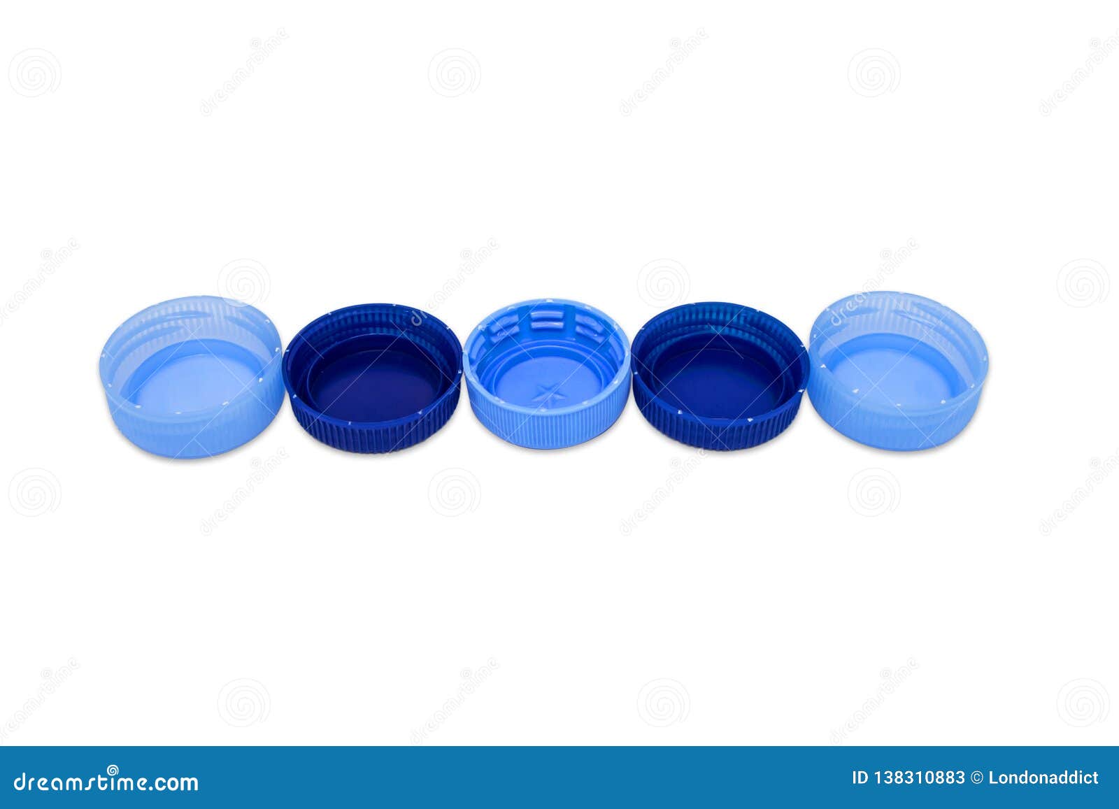 Five Blue Plastics Caps in Line Isolated on White Background. Recycling