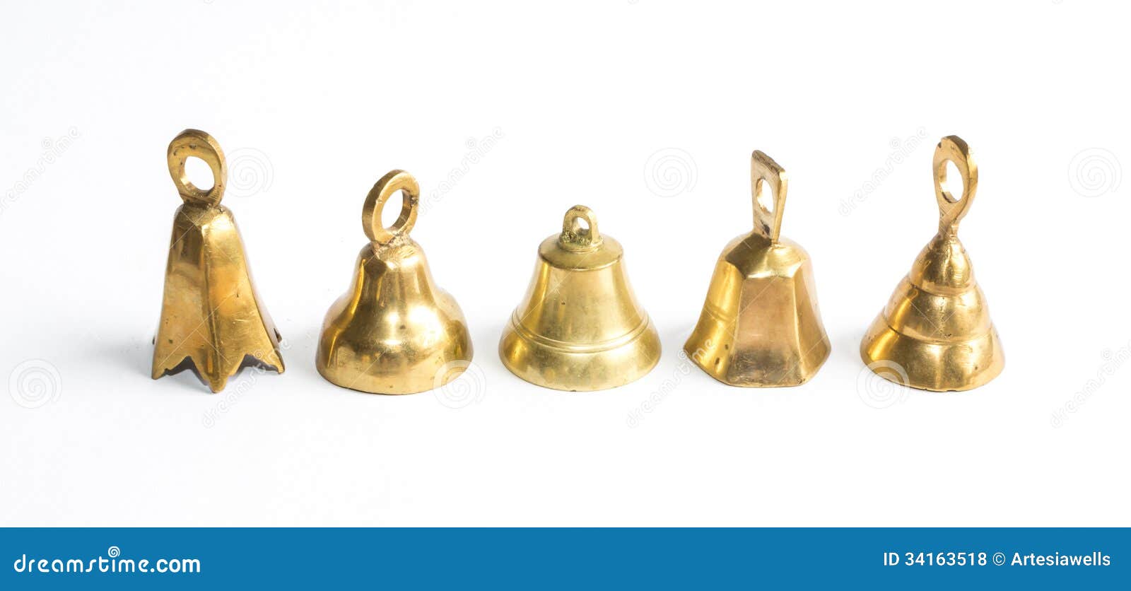 Five brass jingle bells stock photo. Image of element 34163518