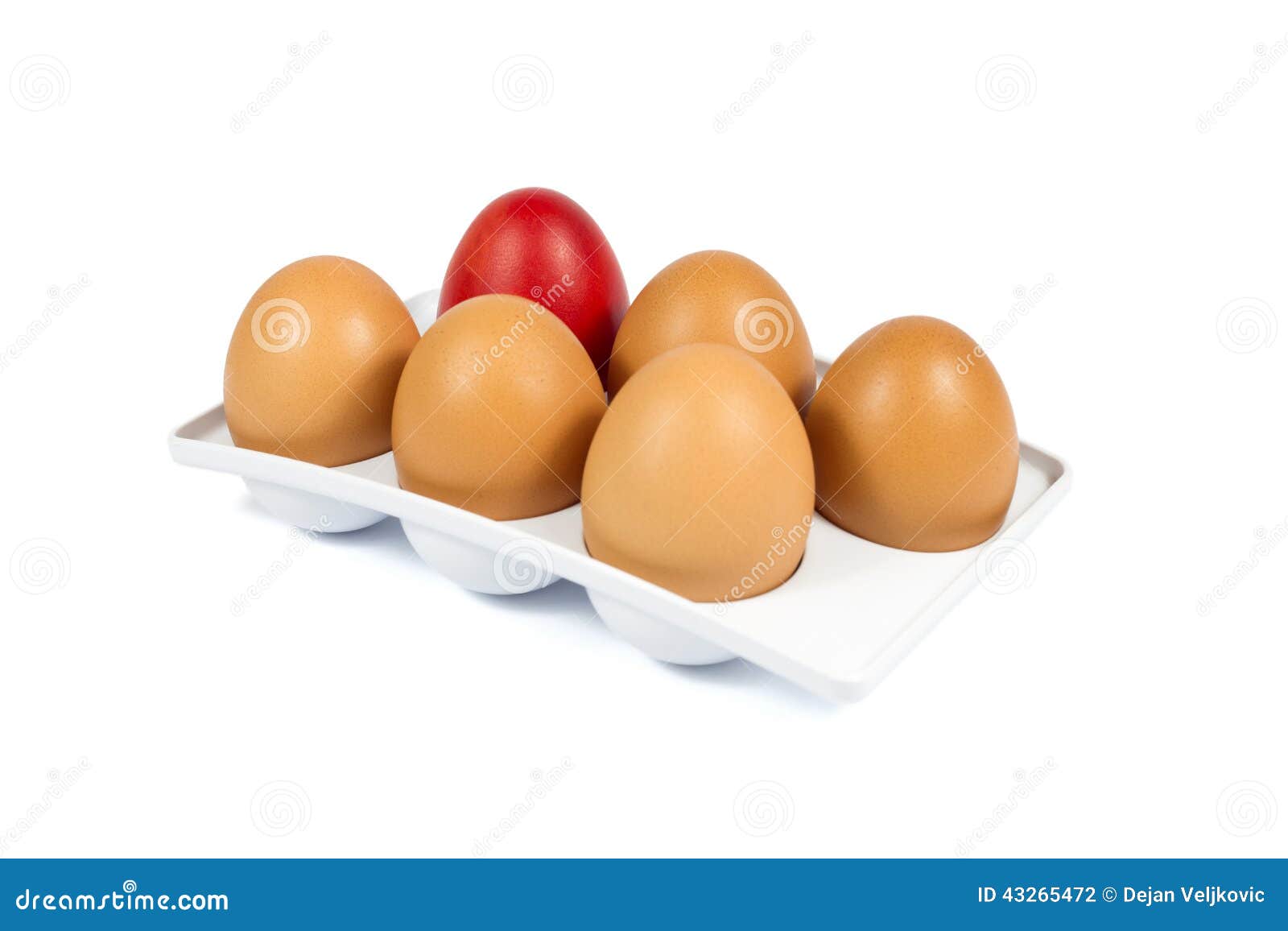Five Brown Eggs and One Red Egg in a White Plastic Package Isolated on