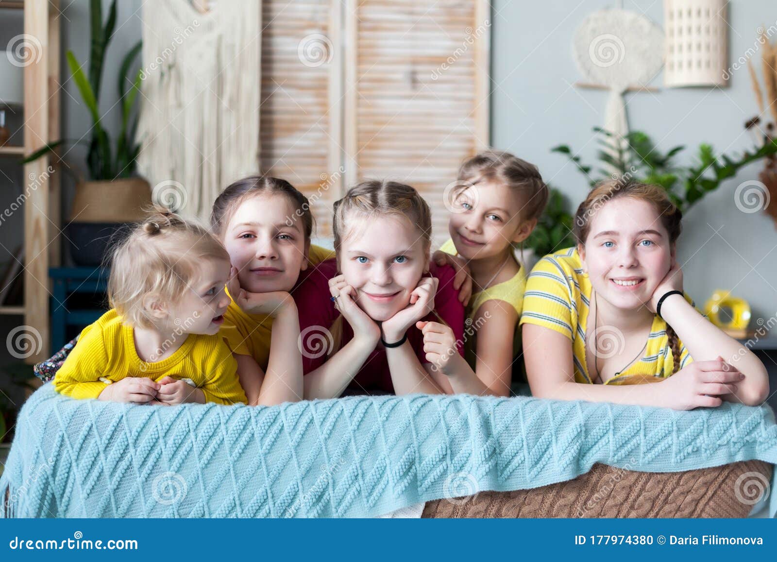 Portrait of Five Sisters on Bed Stock Photo - Image of friendship ...