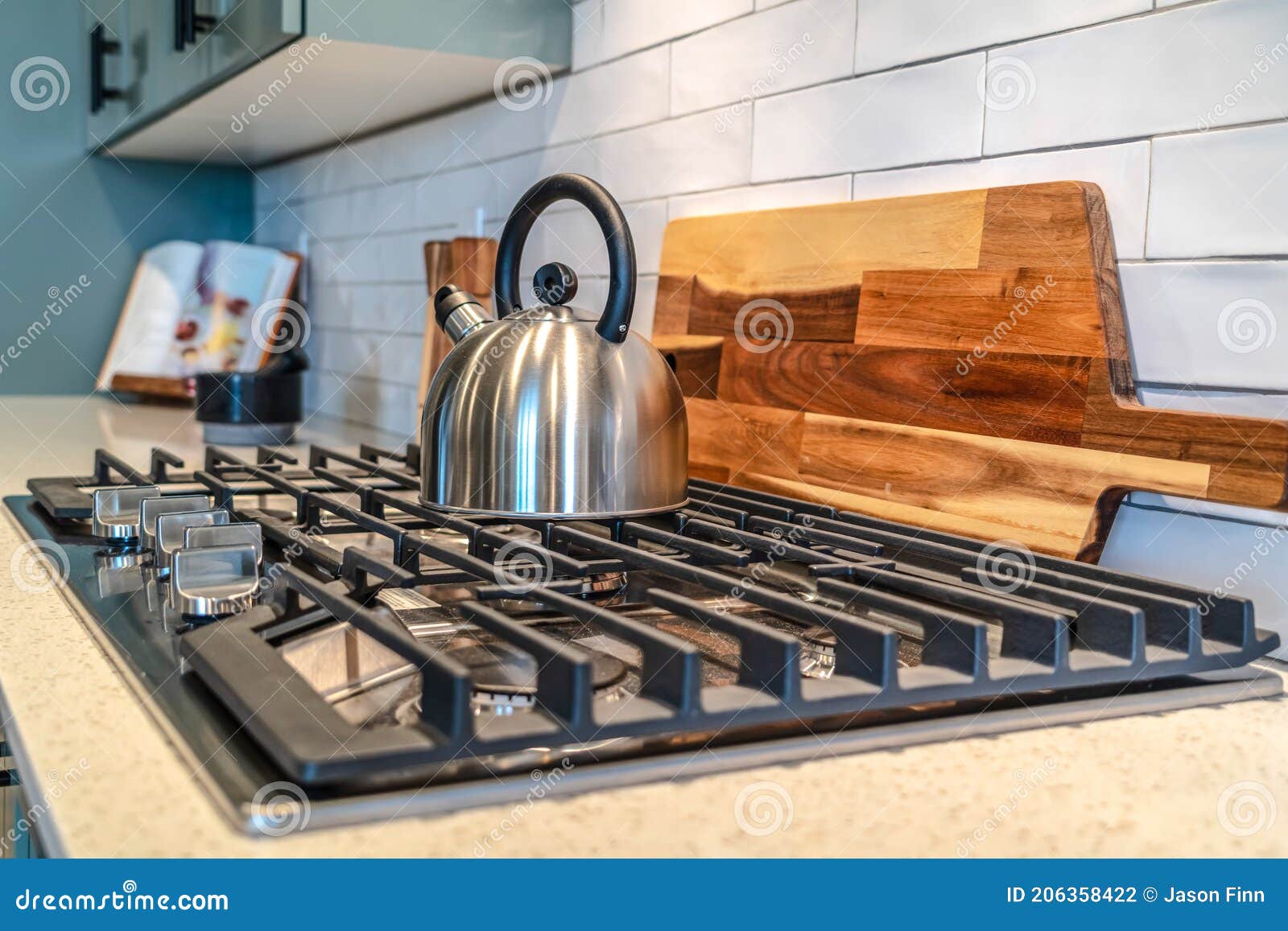 Five Knobs Kitchen Cooktop with Kettle Over the Burners and Cast Iron