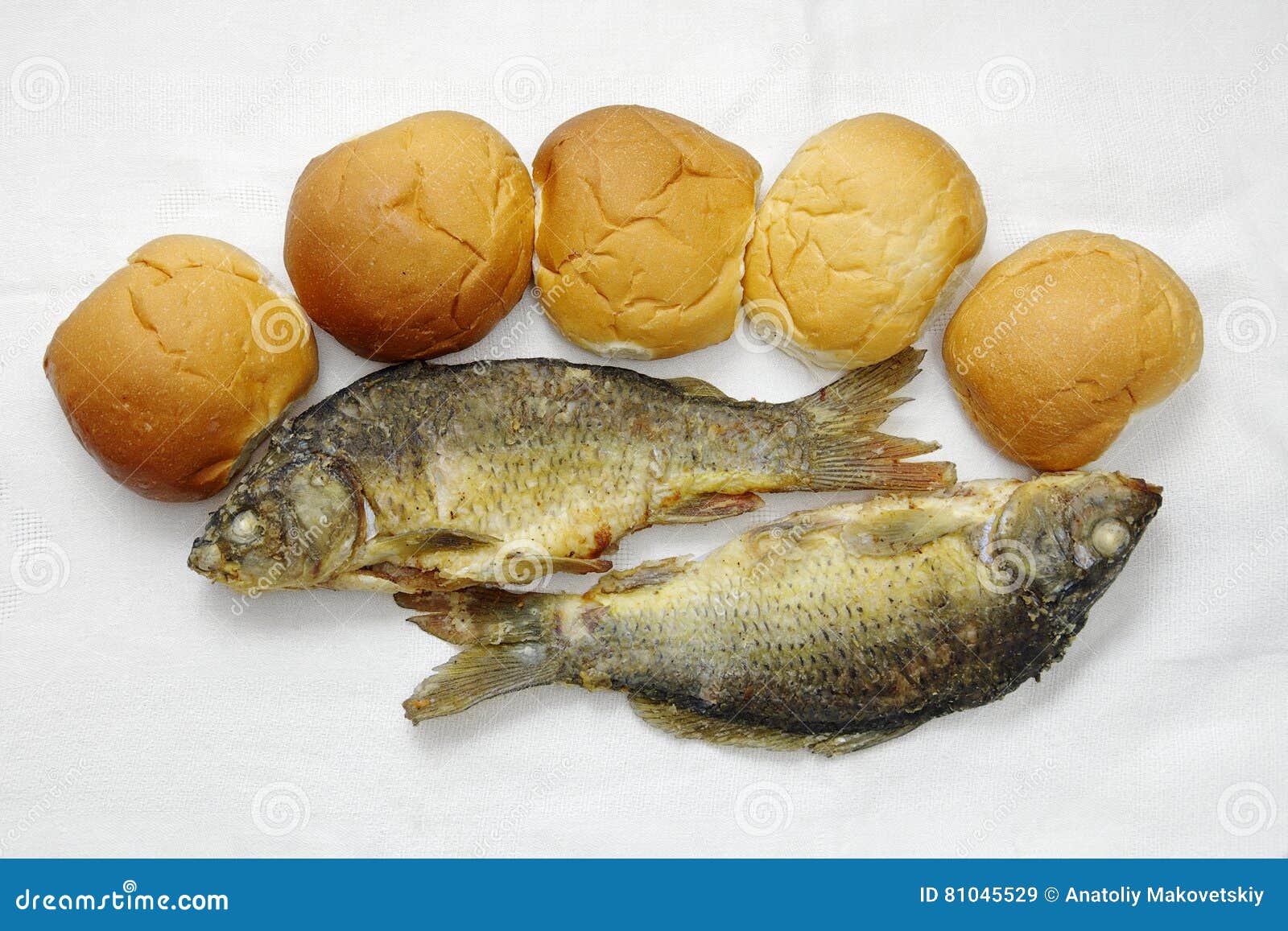 Five Loaves Of Bread And Two Fish RoyaltyFree Stock Photography
