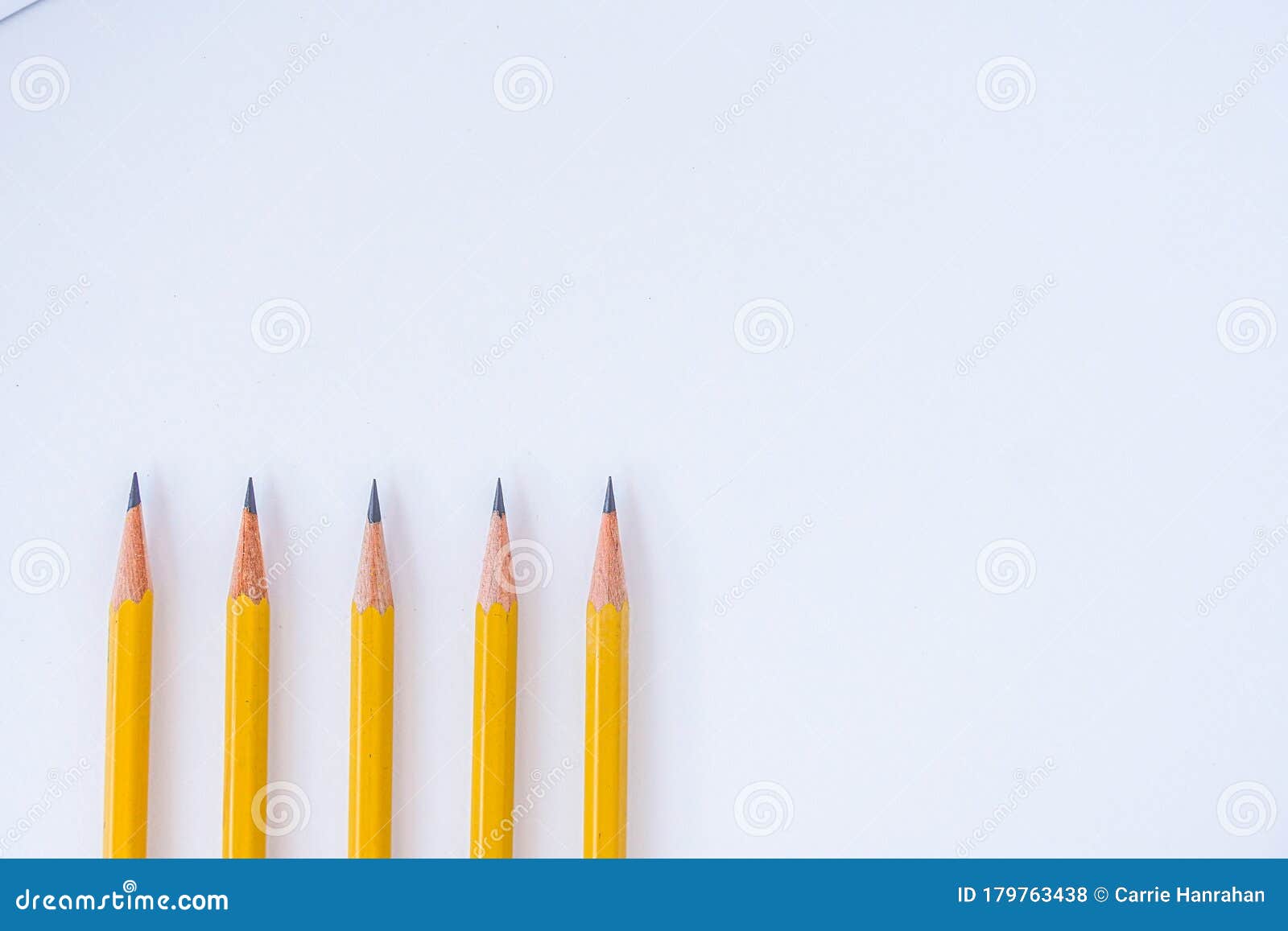 Five Sharpened Pencil Tips Pointing Down On White Background Royalty