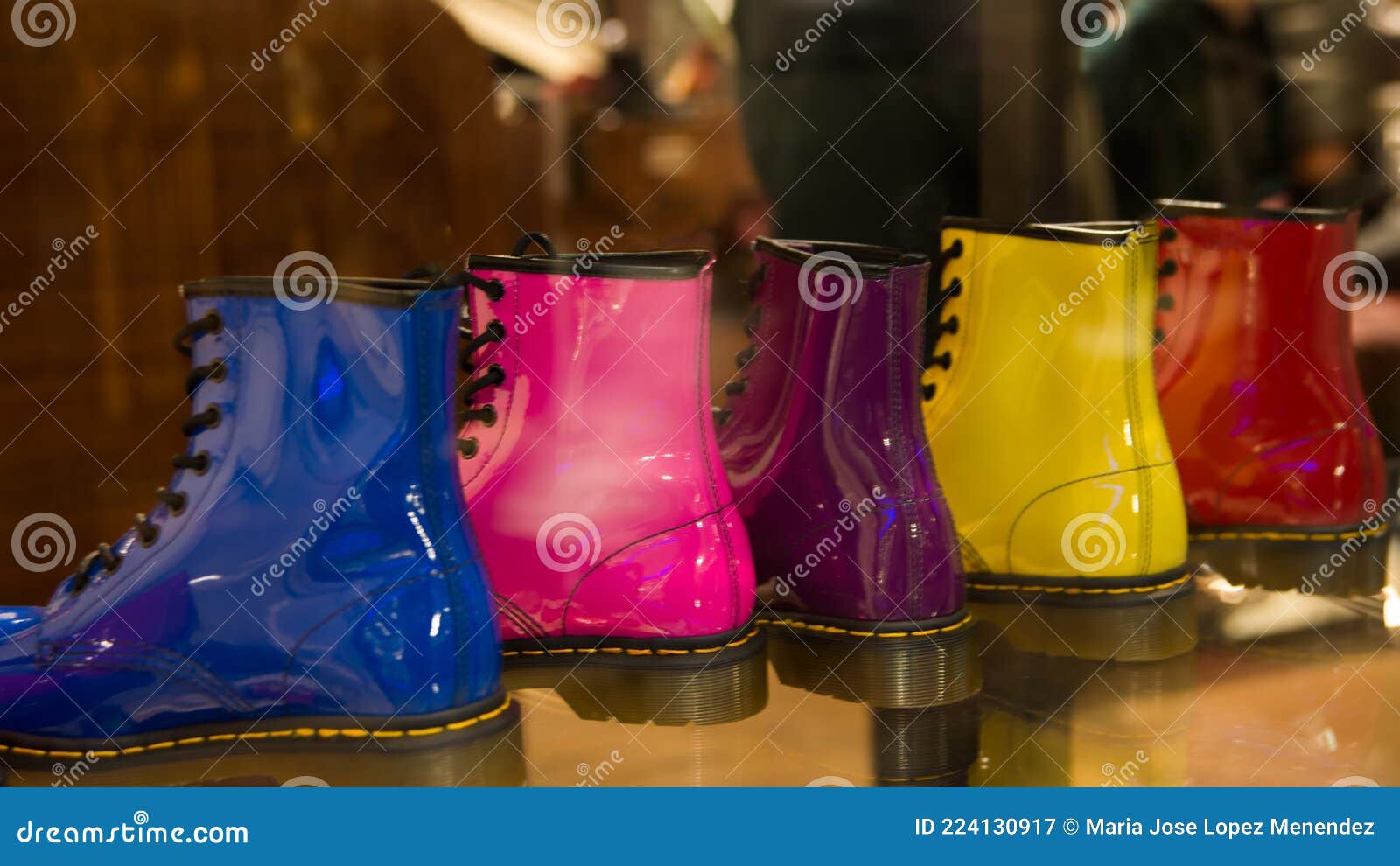 Five Shining Boots in a Row in a Storefront. Same Model, Five Different ...