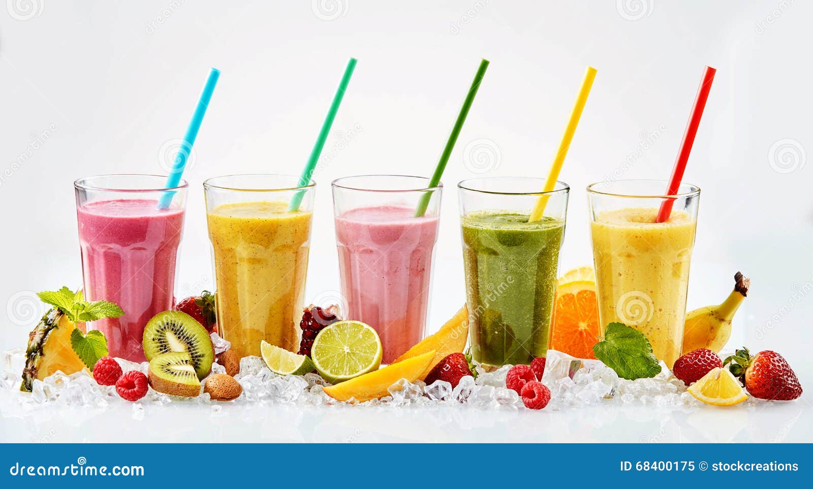 five tall glasses of tropical fruit smoothies stock photo - image
