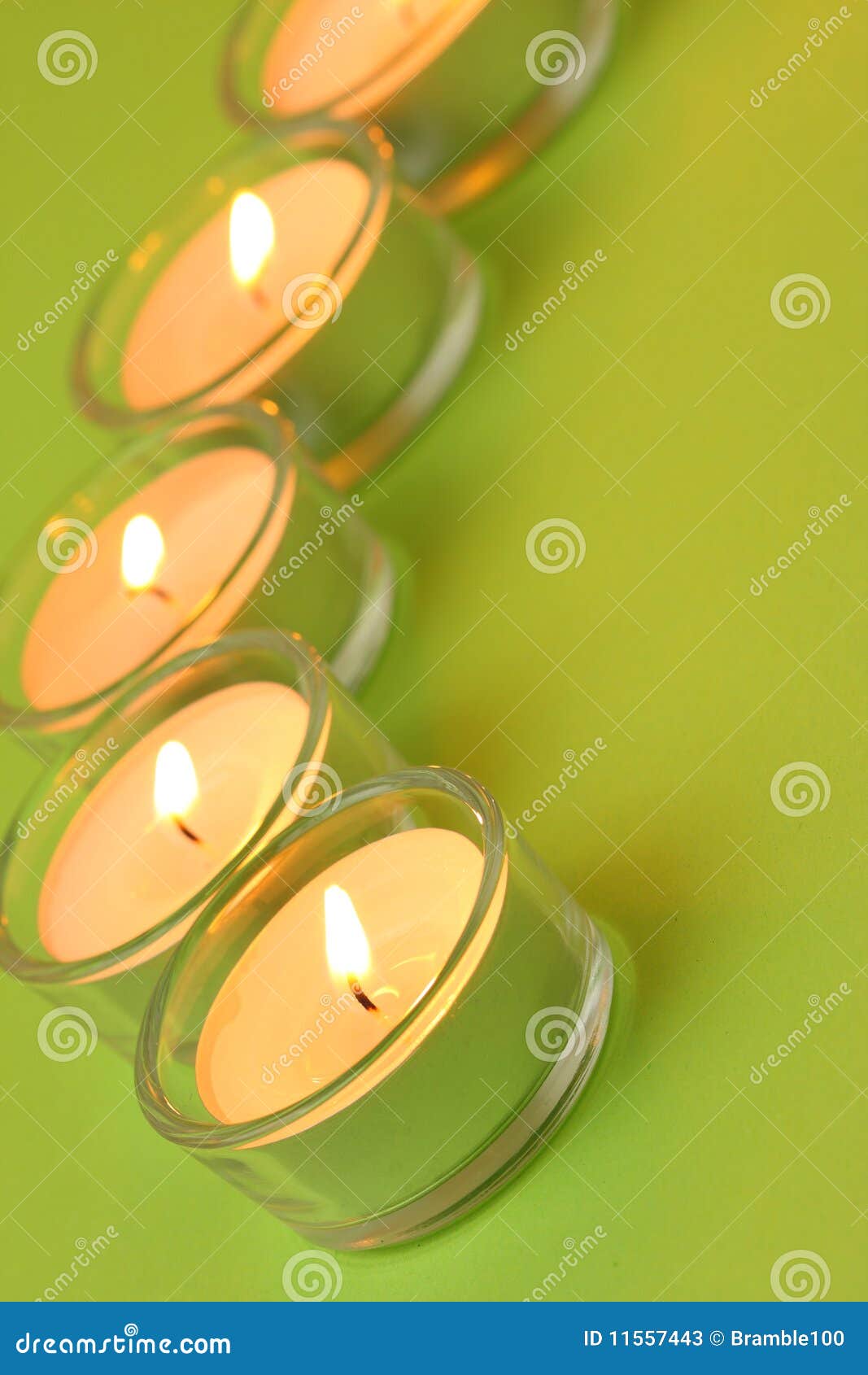 Five tea lights, green stock image. Image of tilted, curve 11557443
