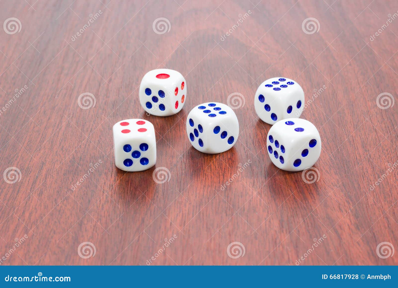 Five Traditional Sixsided Dice On Wooden Surface Stock