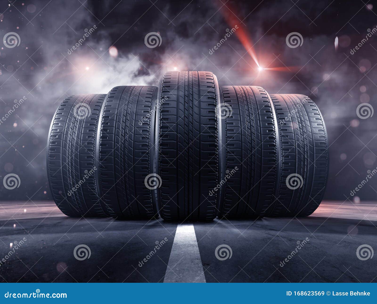 five tyres rolling on a street