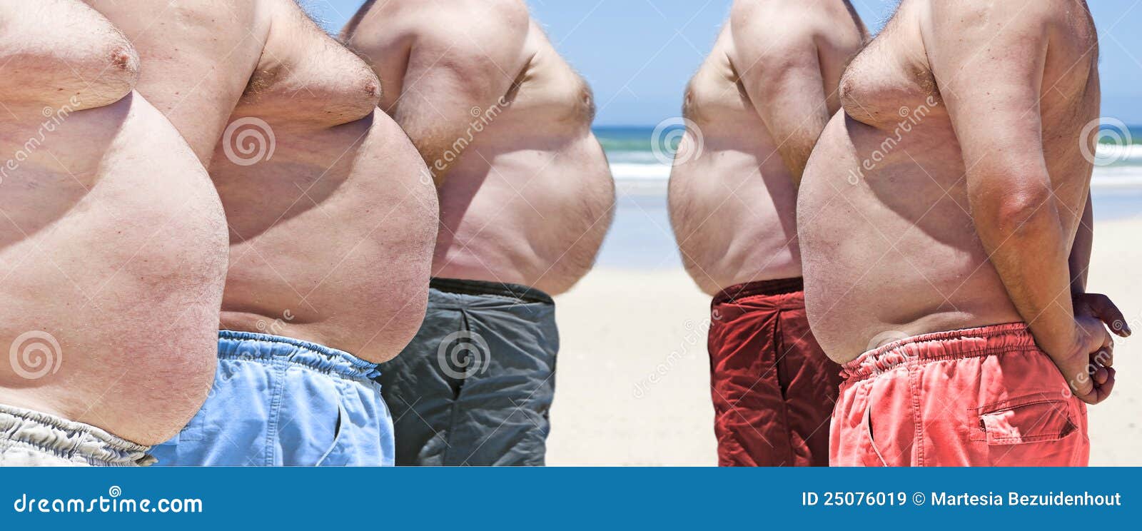 five very obese fat men on the beach